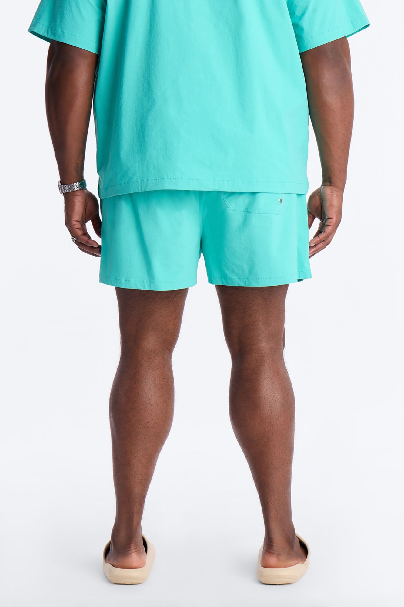 Montez Stretch Swim Trunk 4″ - Teal Fashion Nova