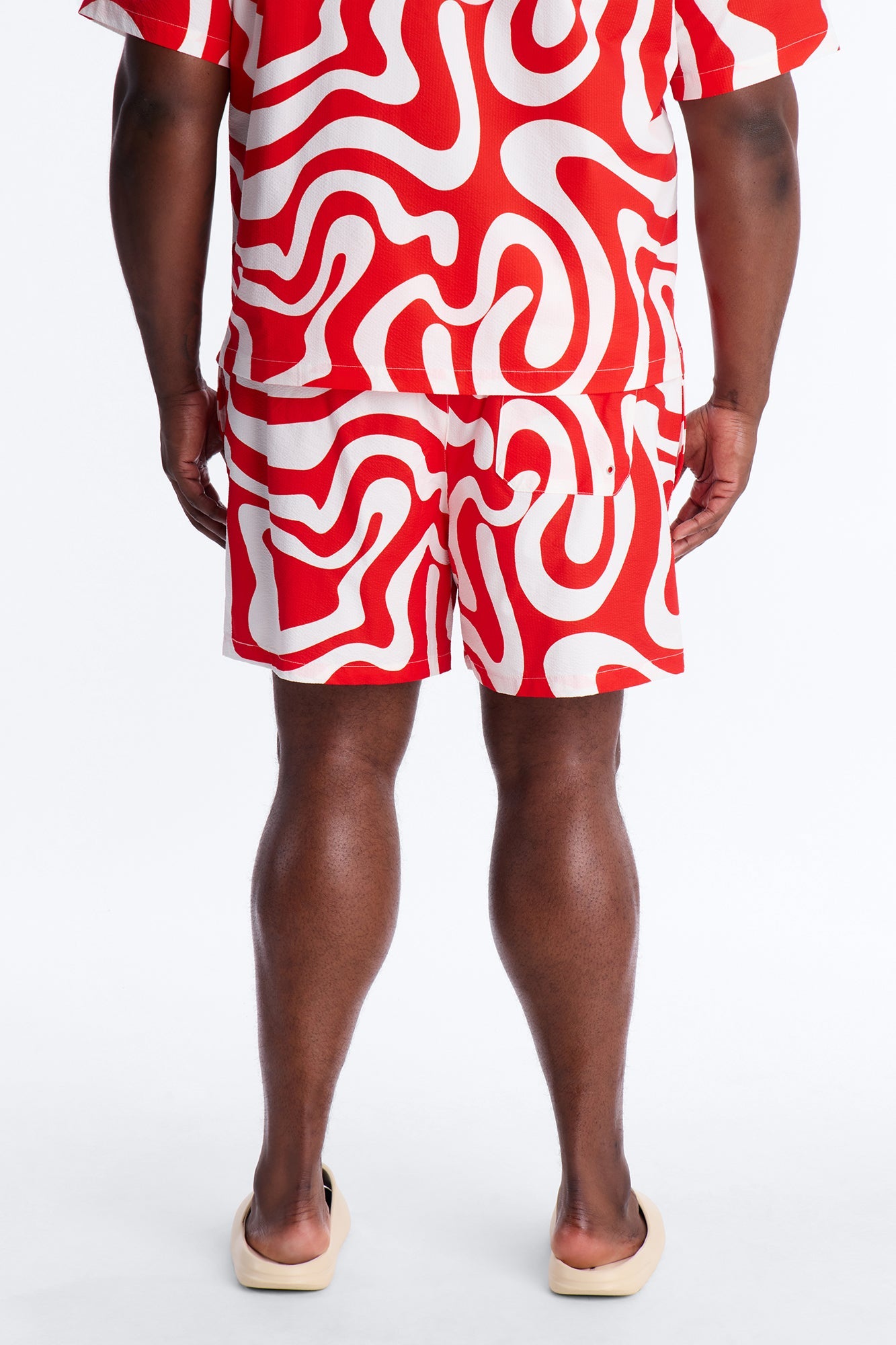 Groovy Abstract Printed Seersucker Swim Trunk 6″ - Red Fashion Nova