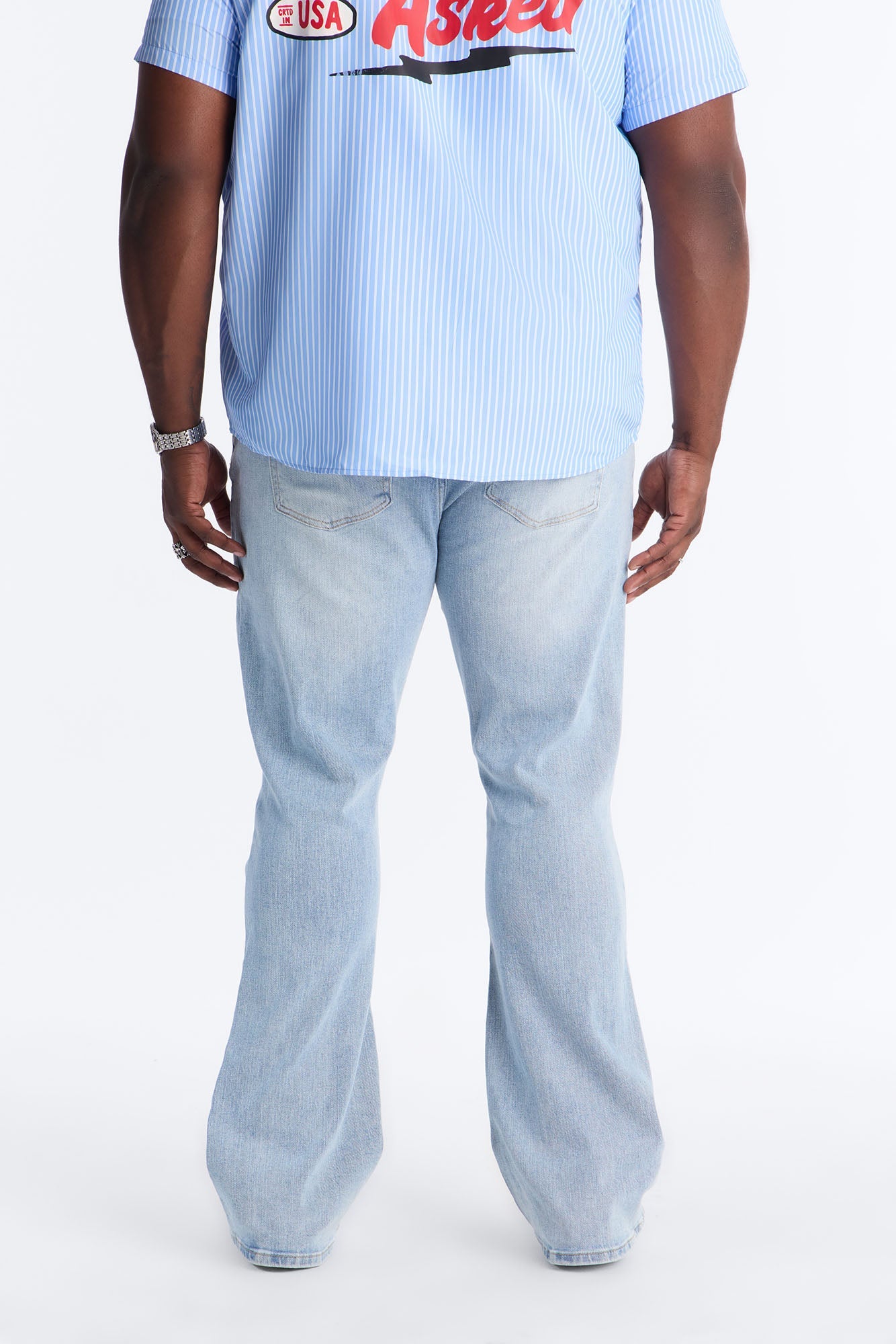 Essential Destroyed Stacked Skinny Flare Stretch Jean - Light Blue Wash Fashion Nova