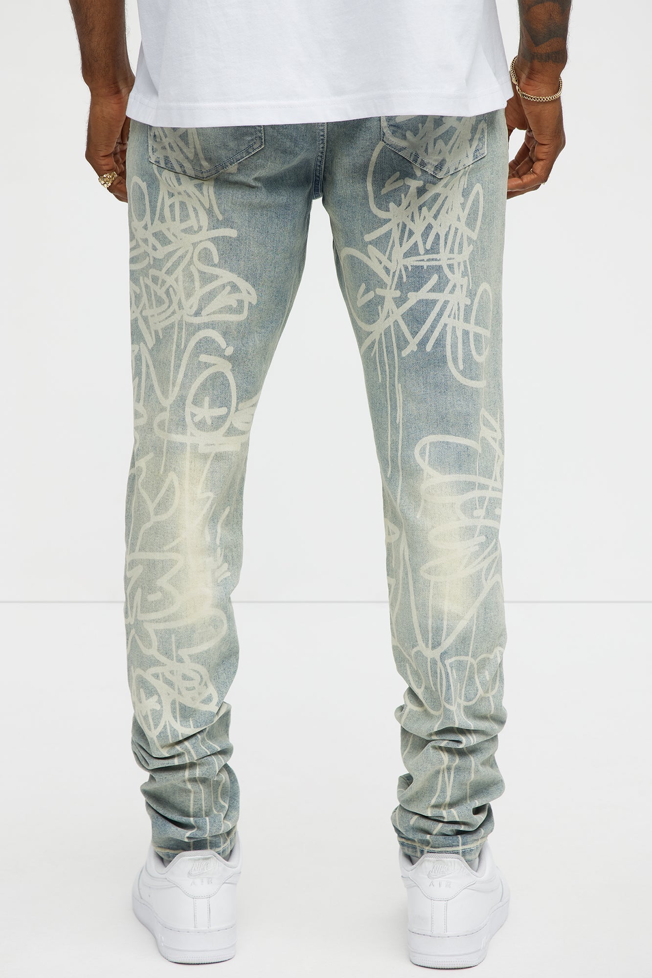 Graffiti Art Stacked Skinny Jeans - Light Wash Fashion Nova