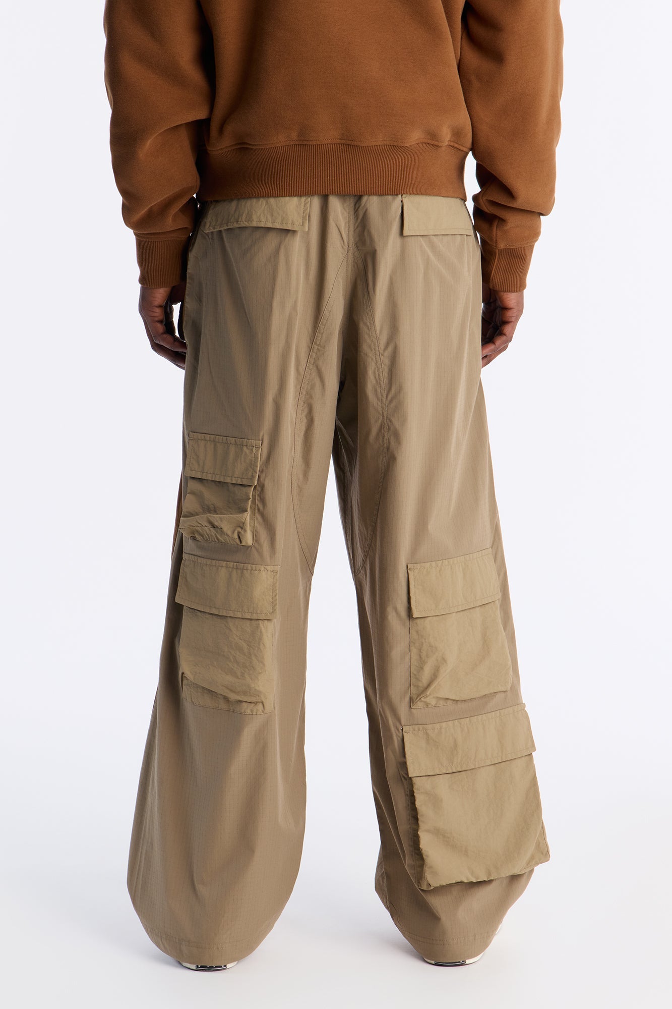 Wide Leg Rear All Over Pocket Tech Pant - Bronze Fashion Nova