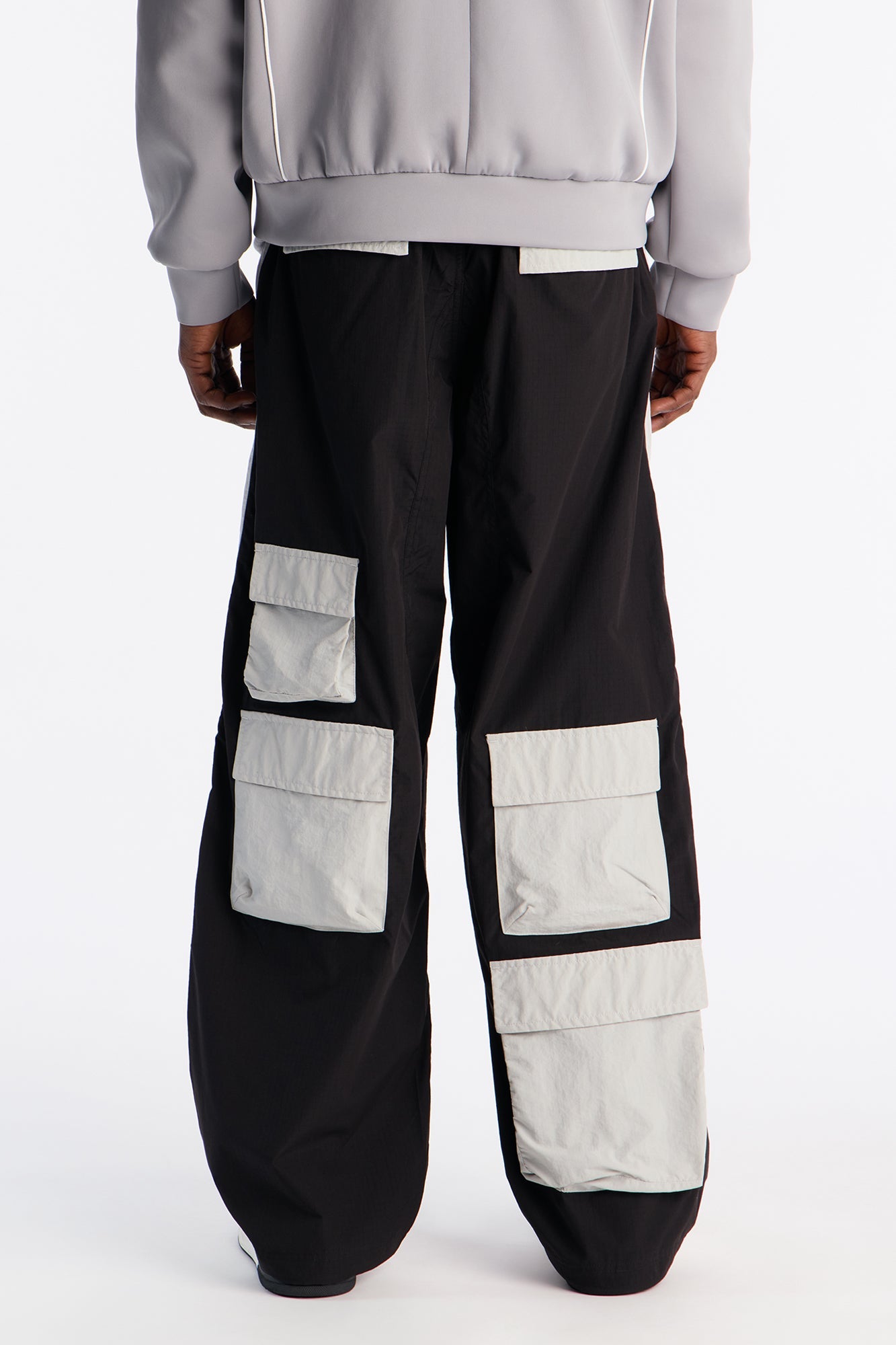 Wide Leg Rear All Over Pocket Tech Pant - Black Fashion Nova