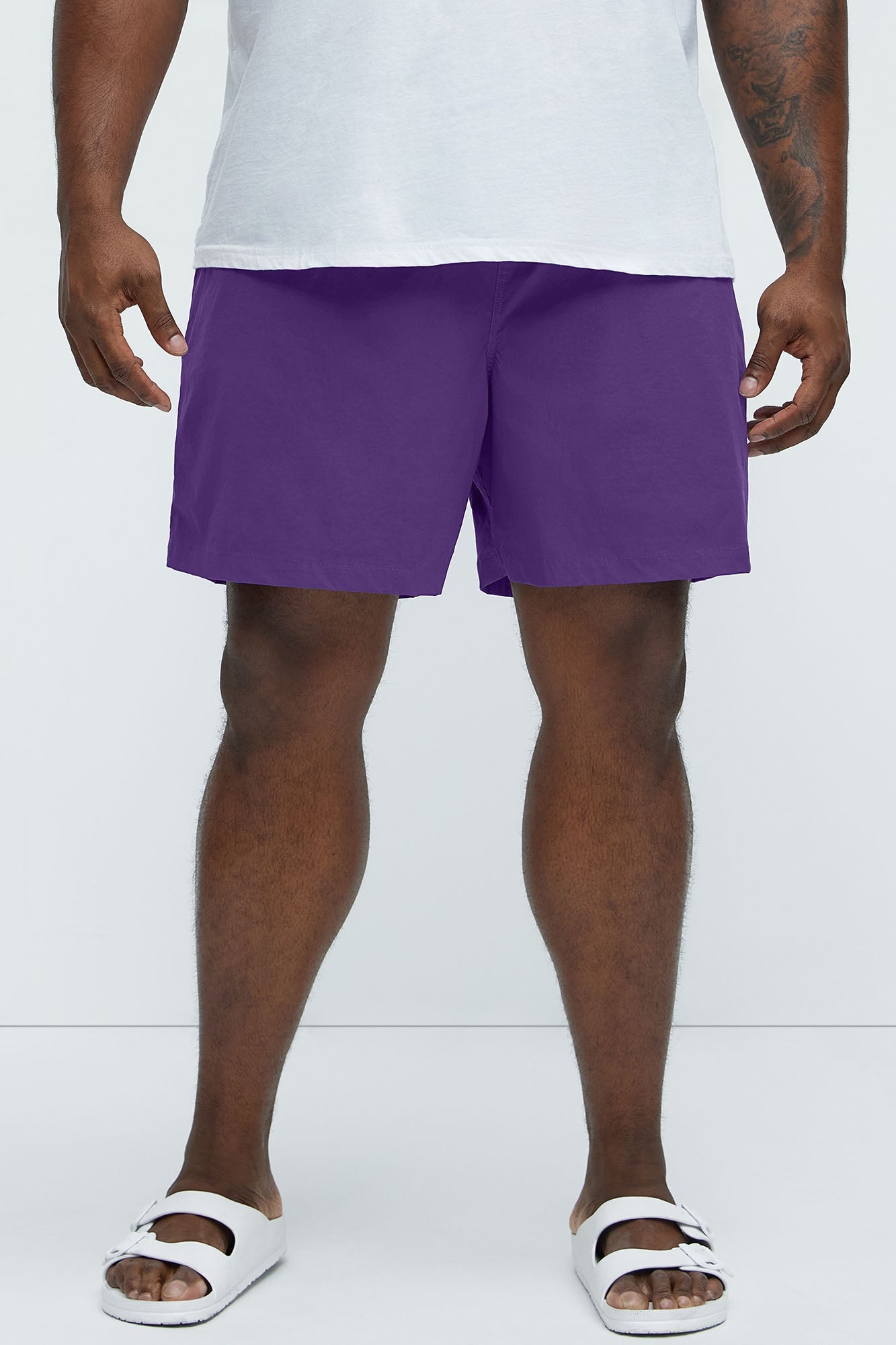 Montez Stretch Swim Trunk 7″ - Purple Fashion Nova