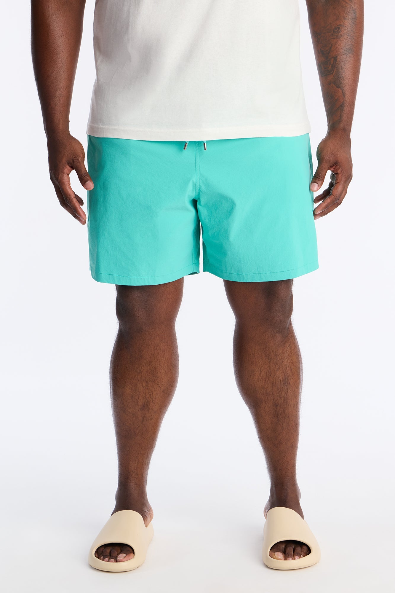 Montez Stretch Swim Trunk 7″ - Teal Fashion Nova