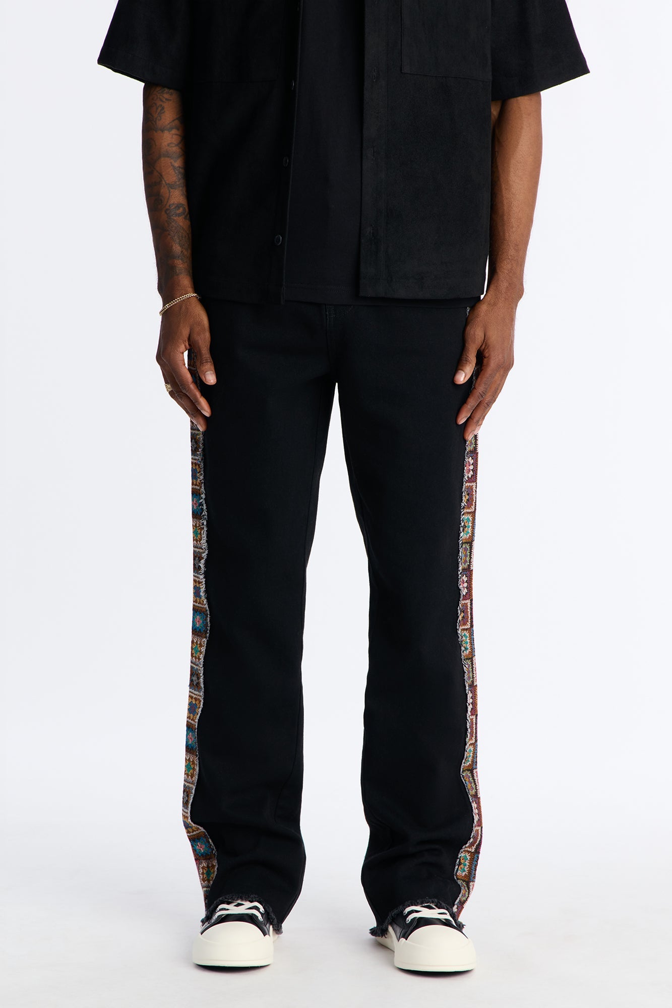 Stacked Slim Flare Split Tapestry Jeans - Black Fashion Nova