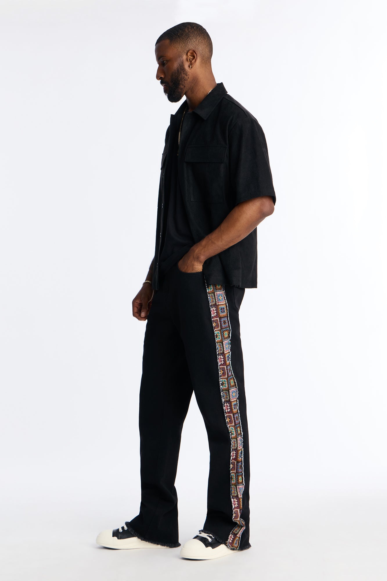 Stacked Slim Flare Split Tapestry Jeans - Black Fashion Nova