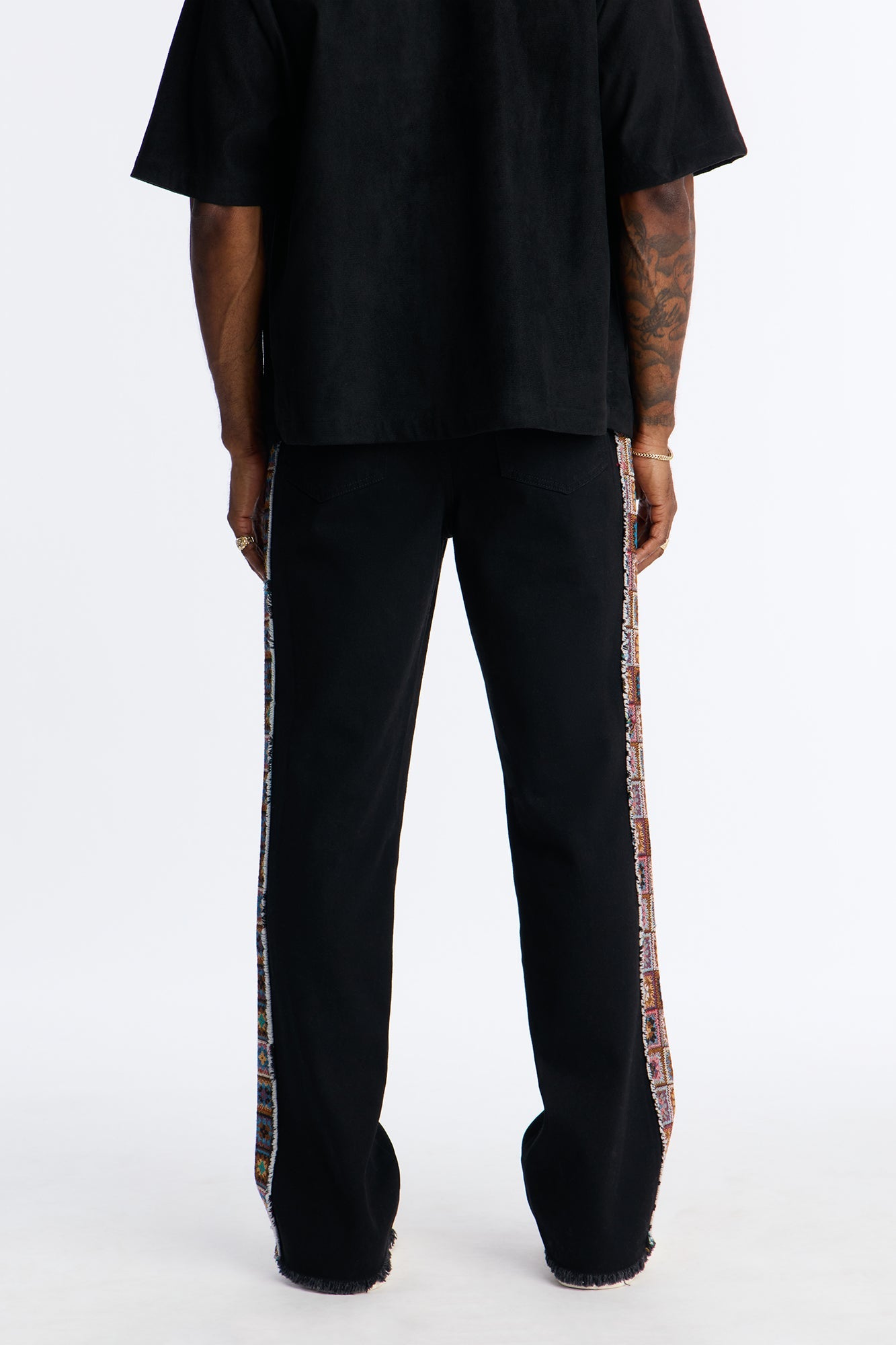 Stacked Slim Flare Split Tapestry Jeans - Black Fashion Nova