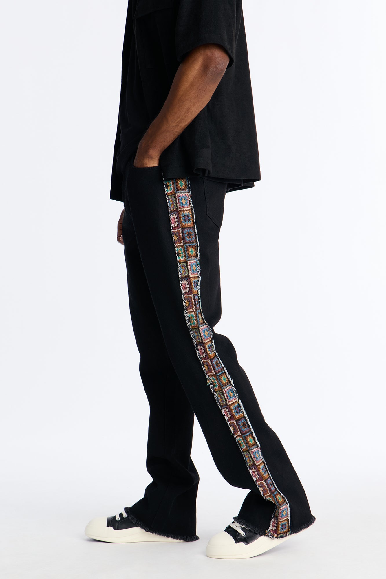 Stacked Slim Flare Split Tapestry Jeans - Black Fashion Nova