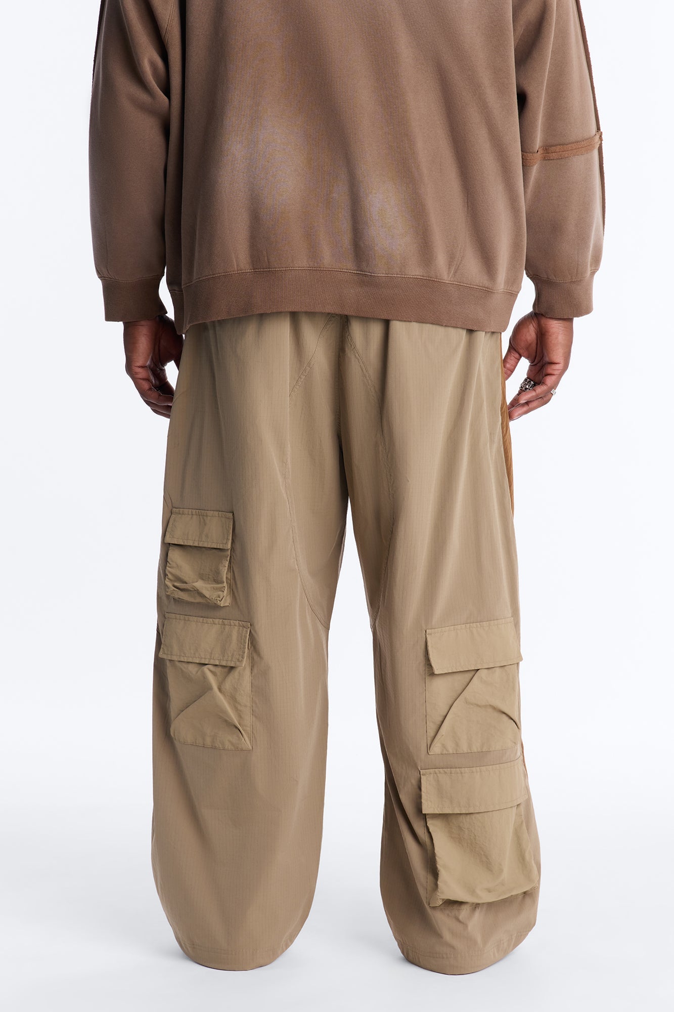 Wide Leg Rear All Over Pocket Tech Pant - Bronze Fashion Nova