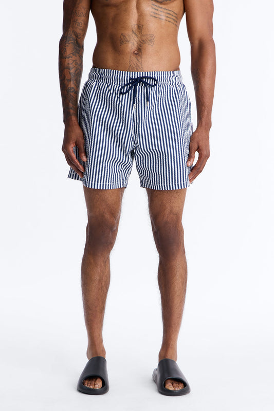 Striped Resort Seersucker Swim Trunk 6″ - Navy Fashion Nova