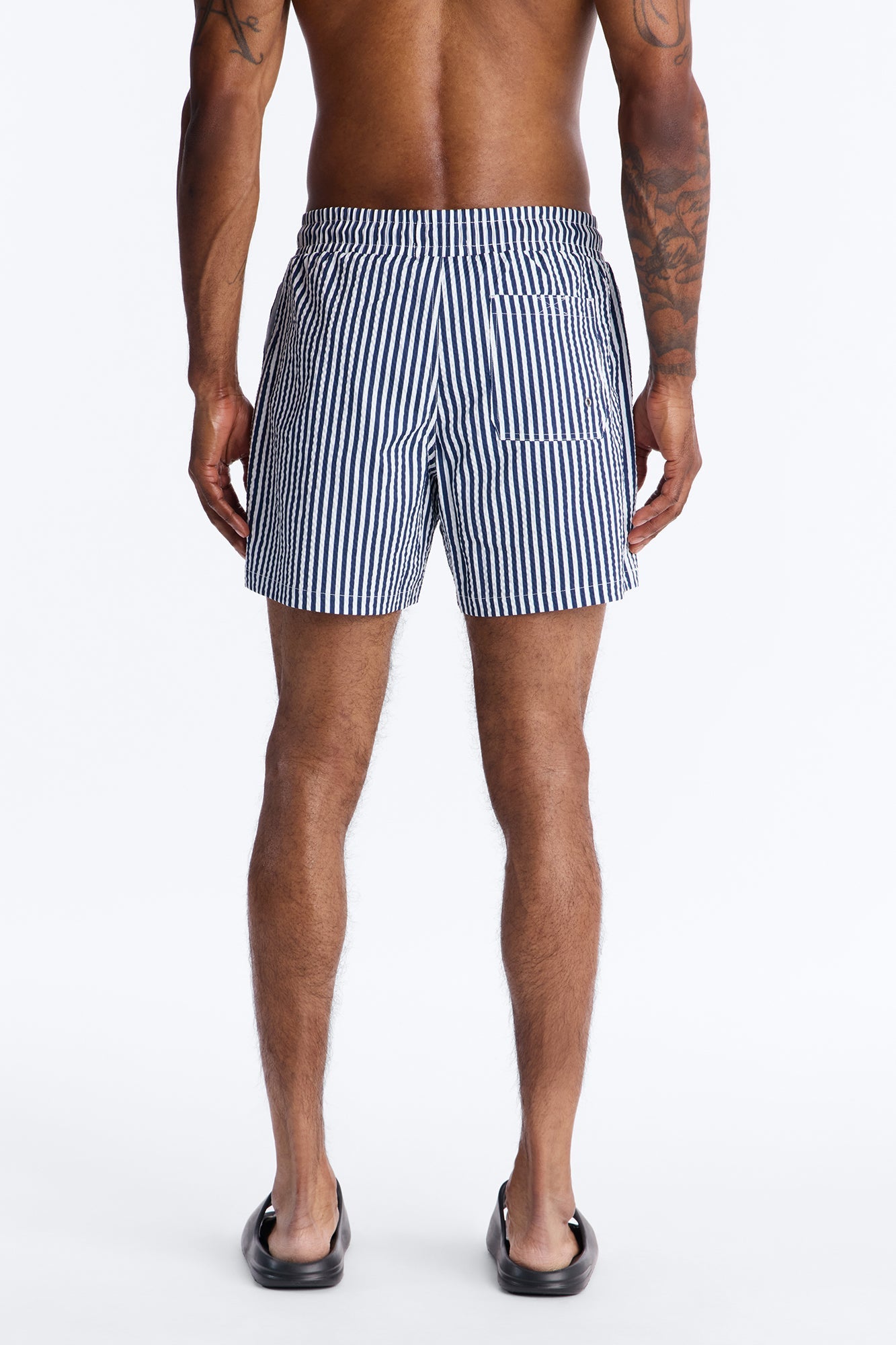 Striped Resort Seersucker Swim Trunk 6″ - Navy Fashion Nova