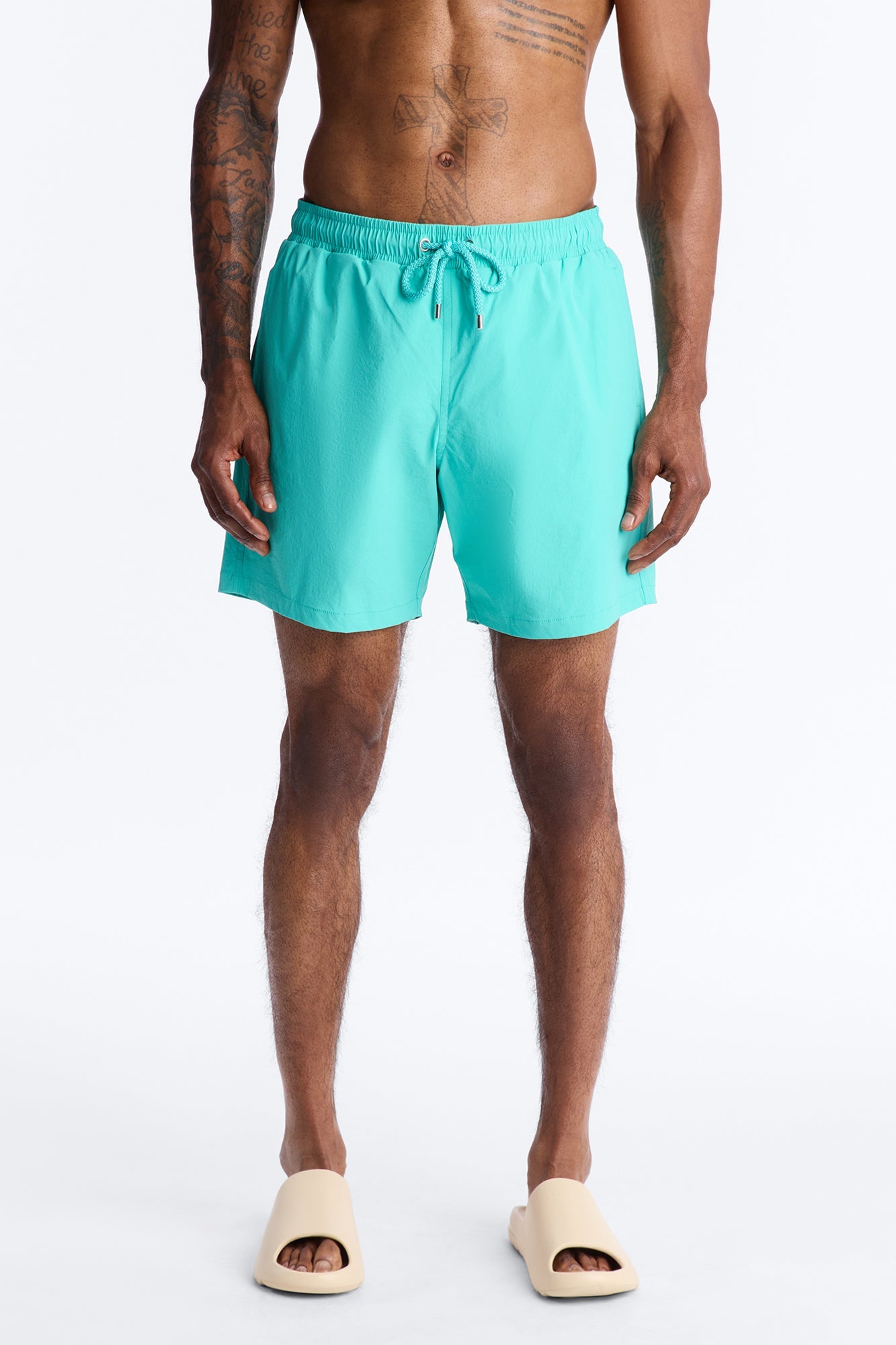 Montez Stretch Swim Trunk 7″ - Teal Fashion Nova