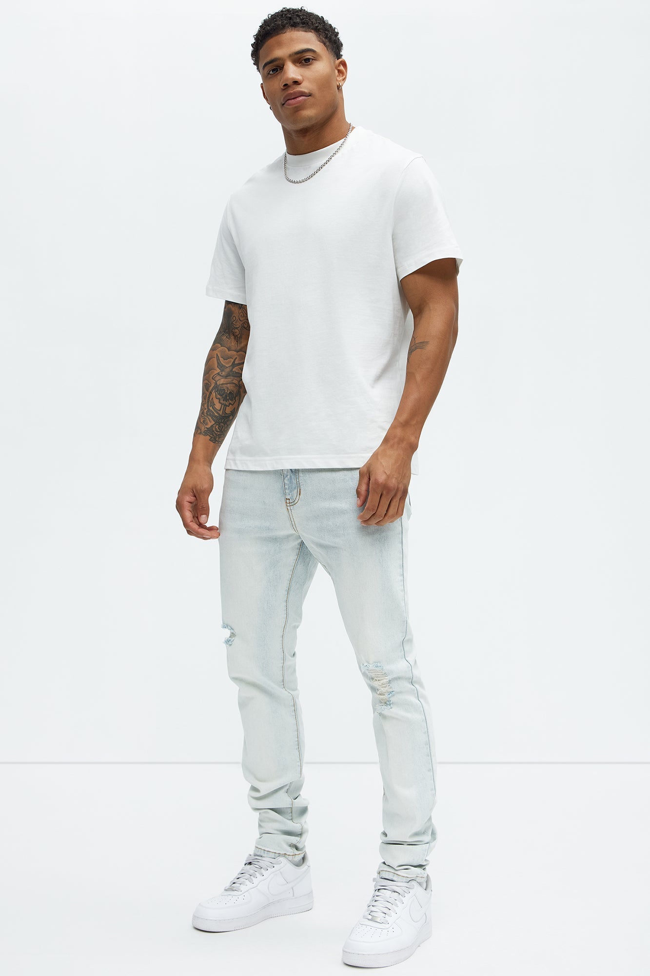 Take No L's Stacked Skinny Jeans - Light Blue Wash Fashion Nova