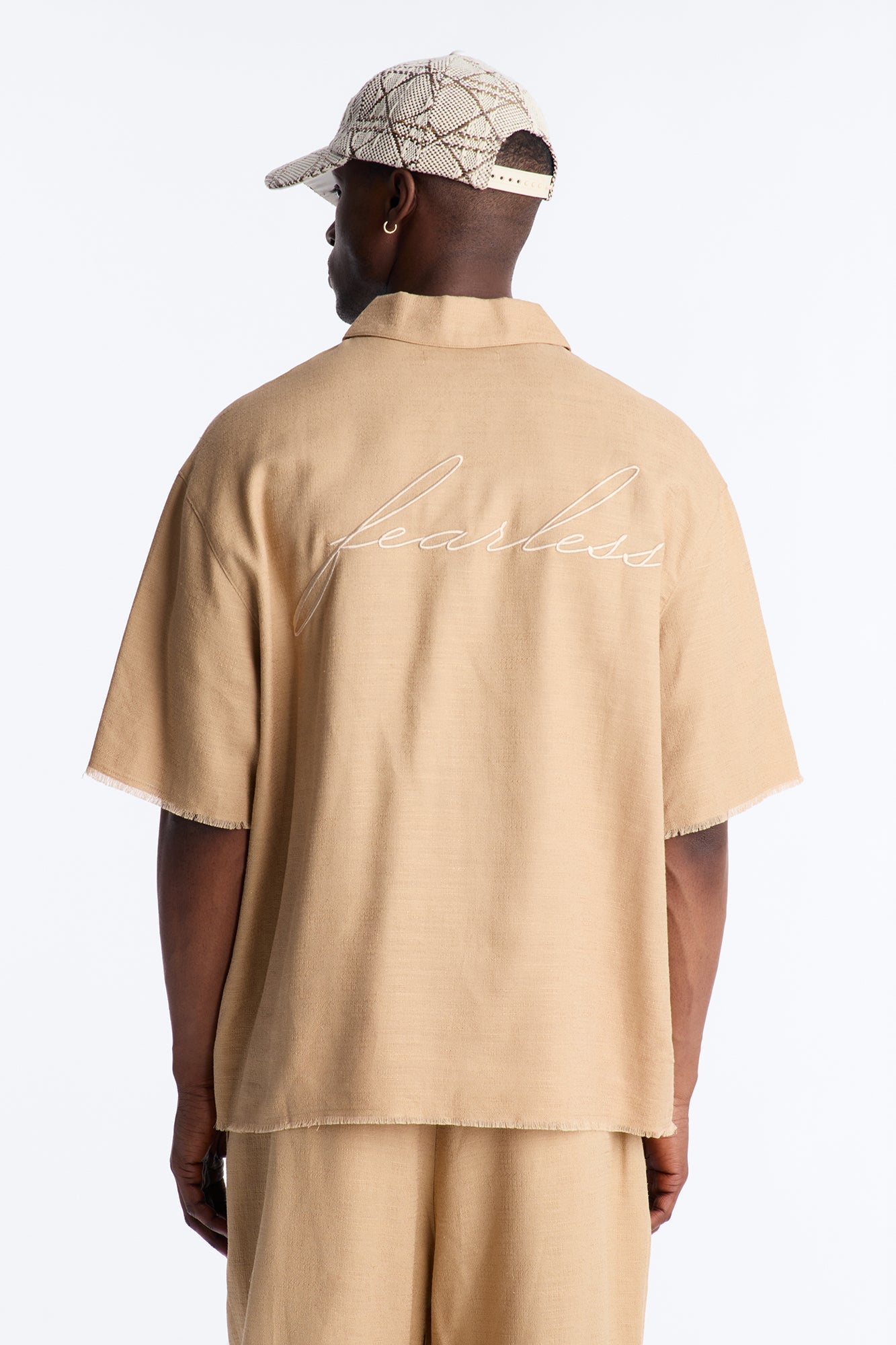 Oversized Tropic Fearless Polo Shirt - Tan Fashion Nova
