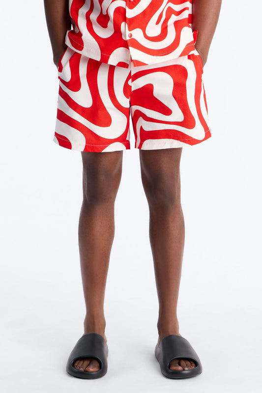 Groovy Abstract Printed Seersucker Swim Trunk 6″ - Red Fashion Nova