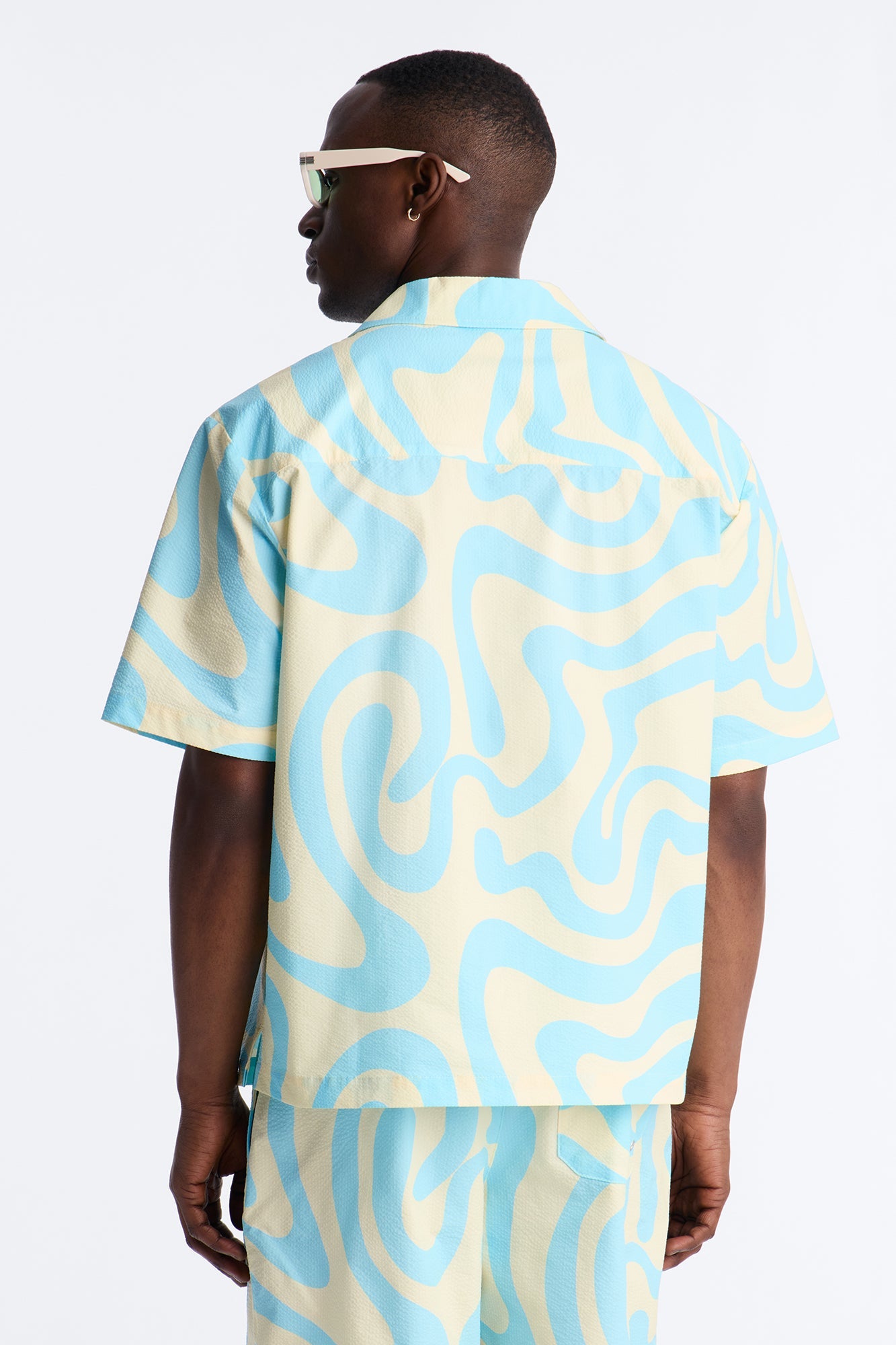 Relaxed Groovy Abstract Printed Seersucker Cuban Collar Button Up Shirt - Blue Fashion Nova