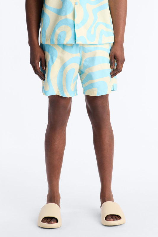 Groovy Abstract Printed Seersucker Swim Trunk 6″ - Blue Fashion Nova