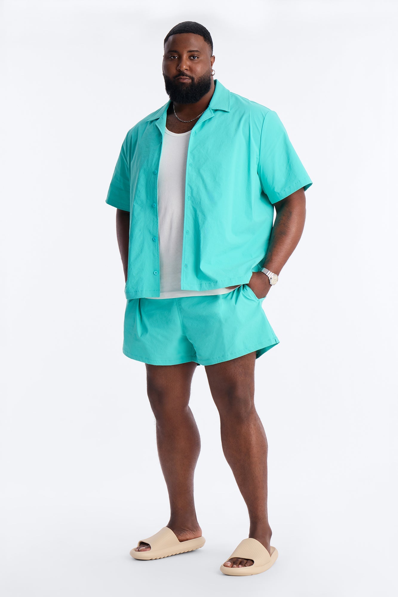 Montez Stretch Swim Trunk 4″ - Teal Fashion Nova