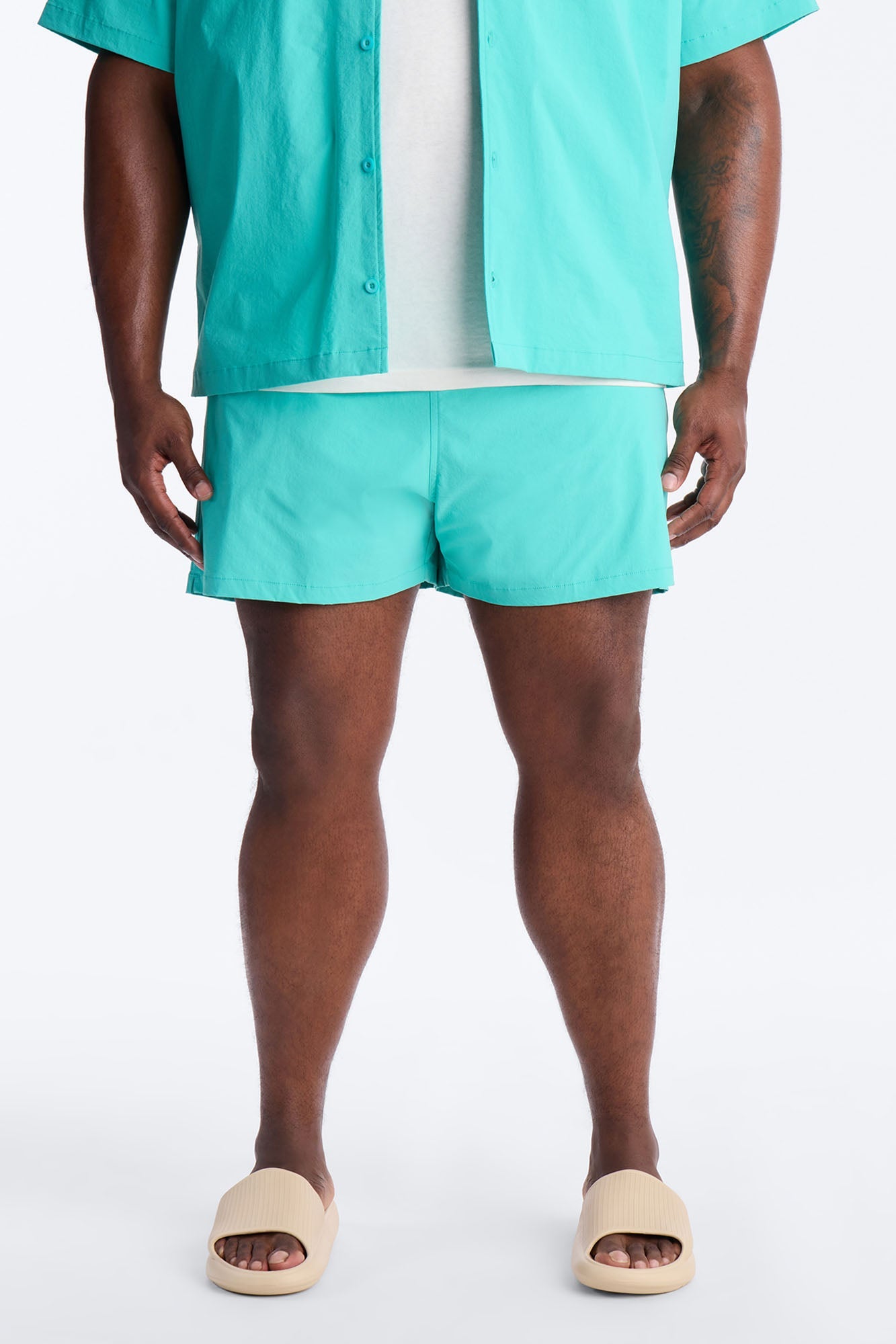 Montez Stretch Swim Trunk 4″ - Teal Fashion Nova
