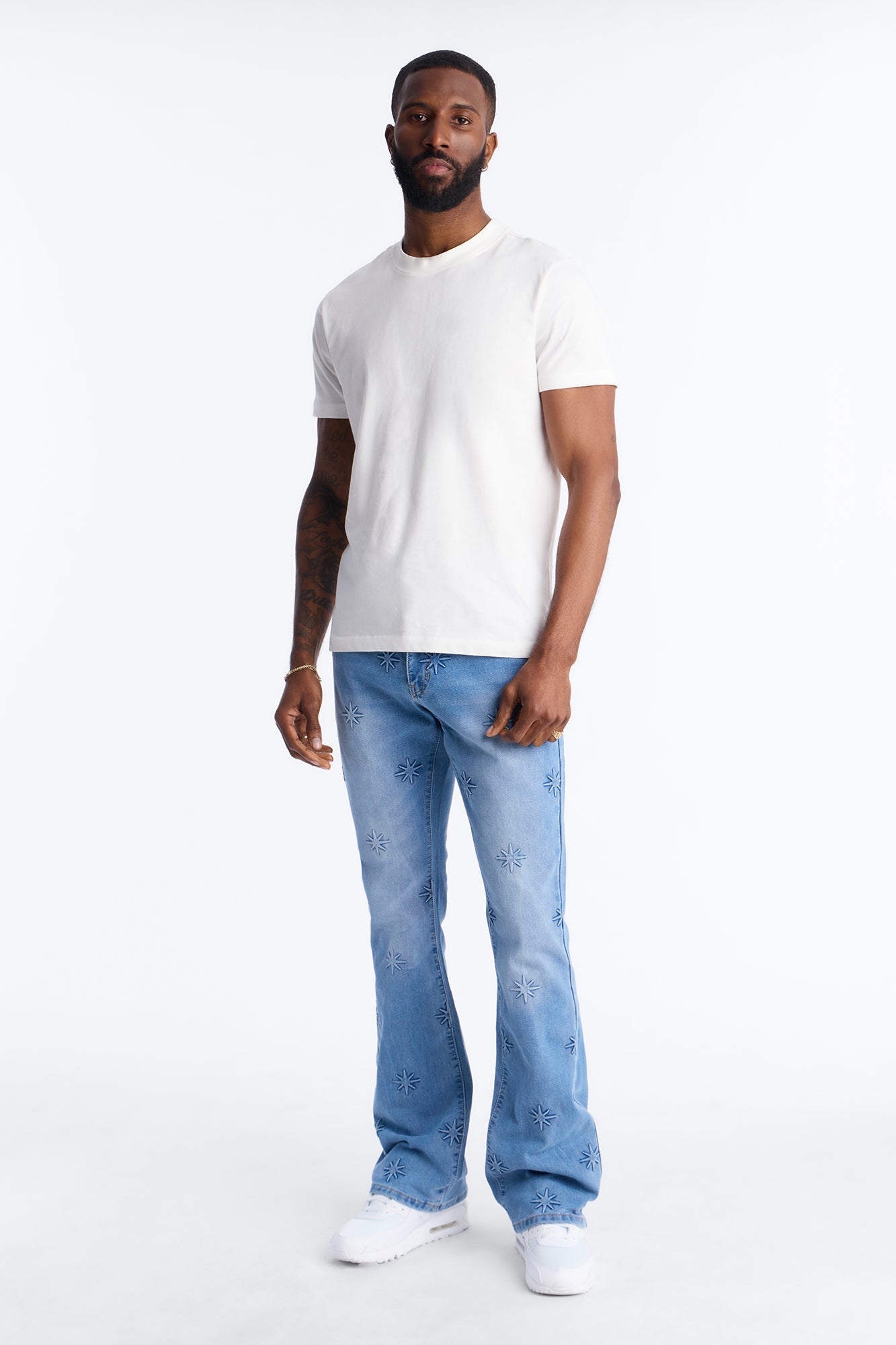 Stacked Slim Flare Embossed Supernova Jeans - Medium Blue Wash Fashion Nova