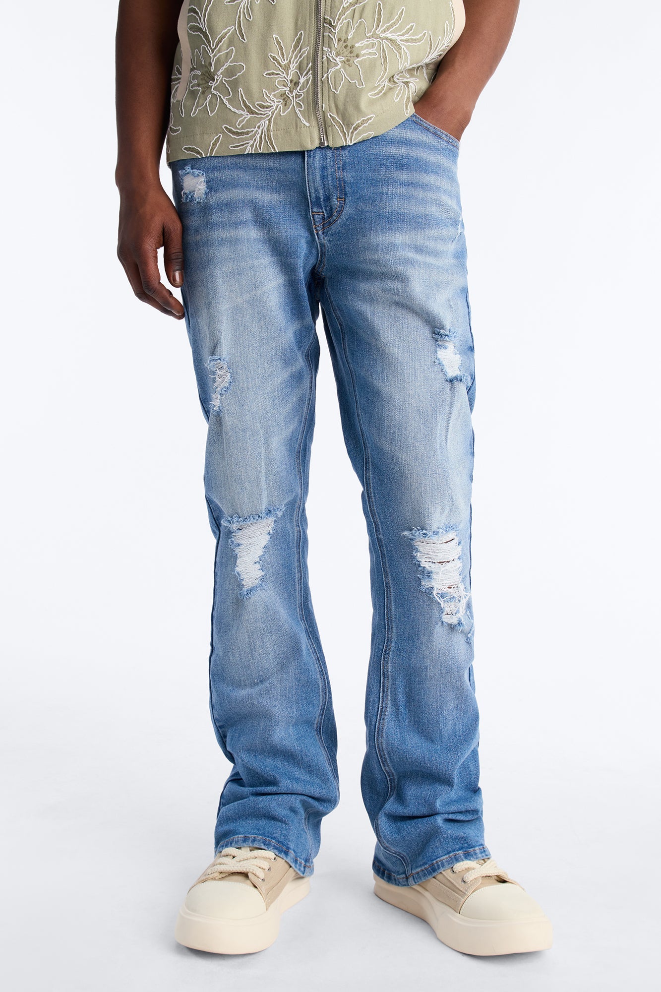 Essential Destroyed Stacked Skinny Flare Stretch Jean - Medium Blue Wash Fashion Nova