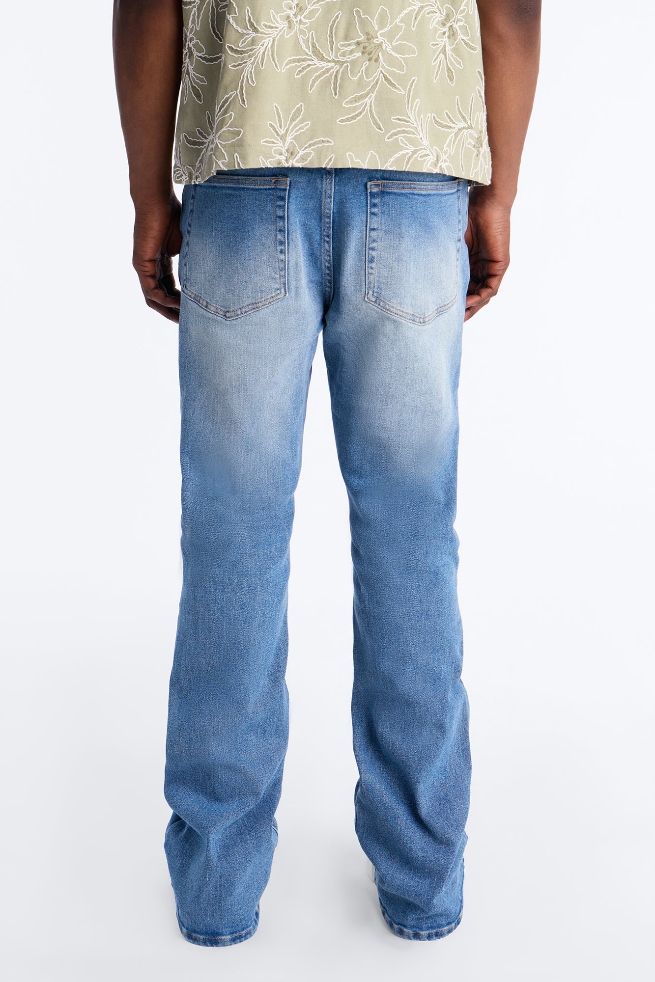 Essential Destroyed Stacked Skinny Flare Stretch Jean - Medium Blue Wash Fashion Nova