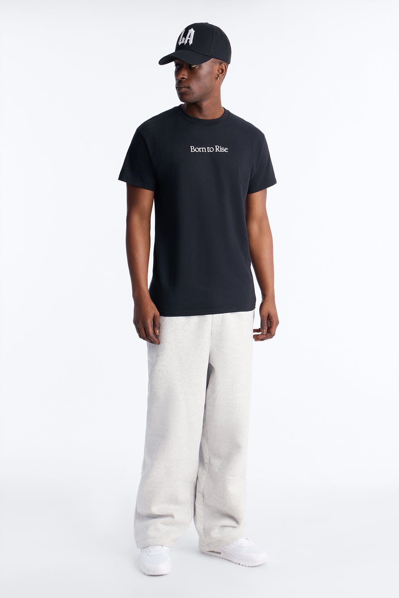 Born To Rise Short Sleeve Tee - Black Fashion Nova