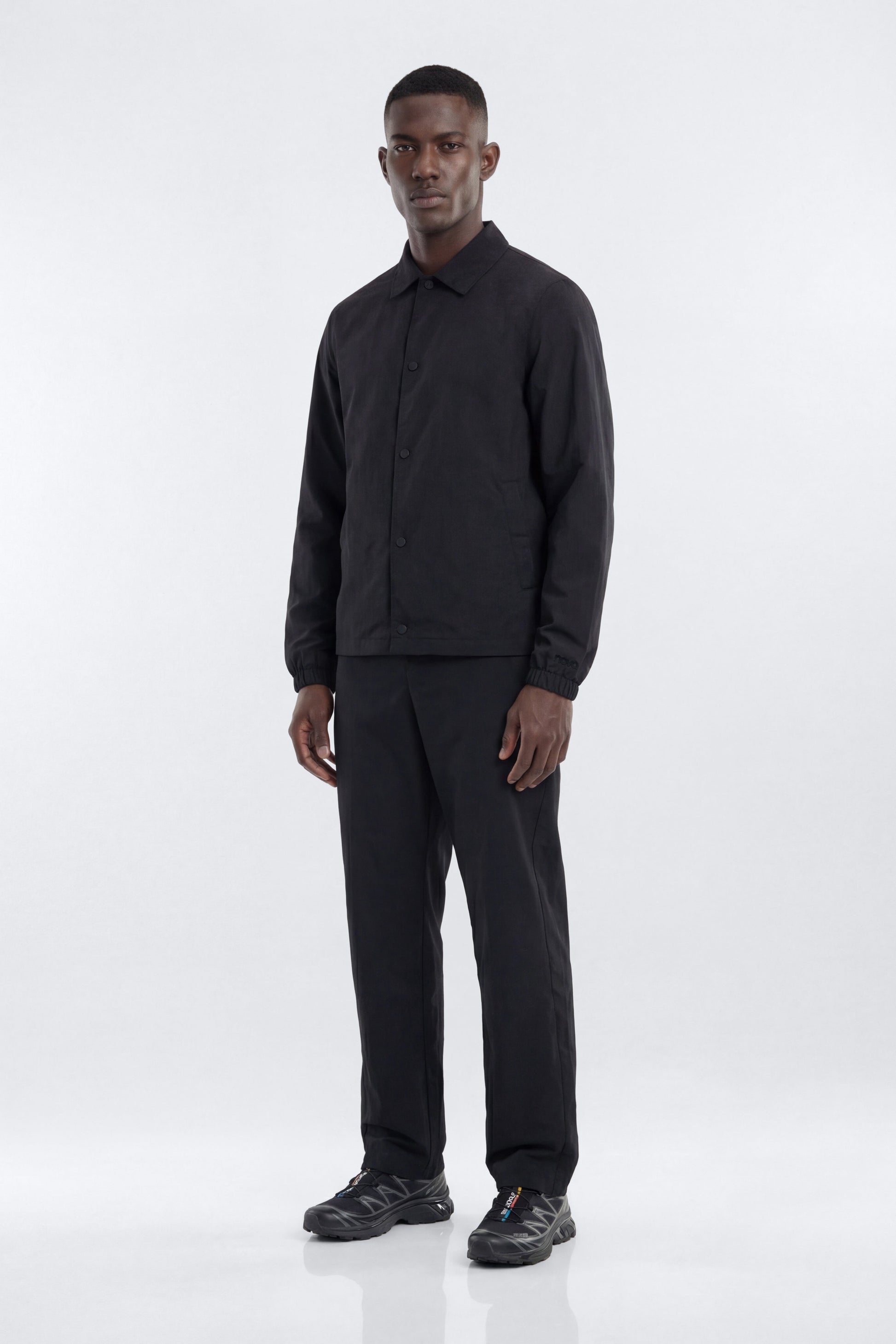 CoreNylon 32″ Front Snap Active Pants - Black Fashion Nova