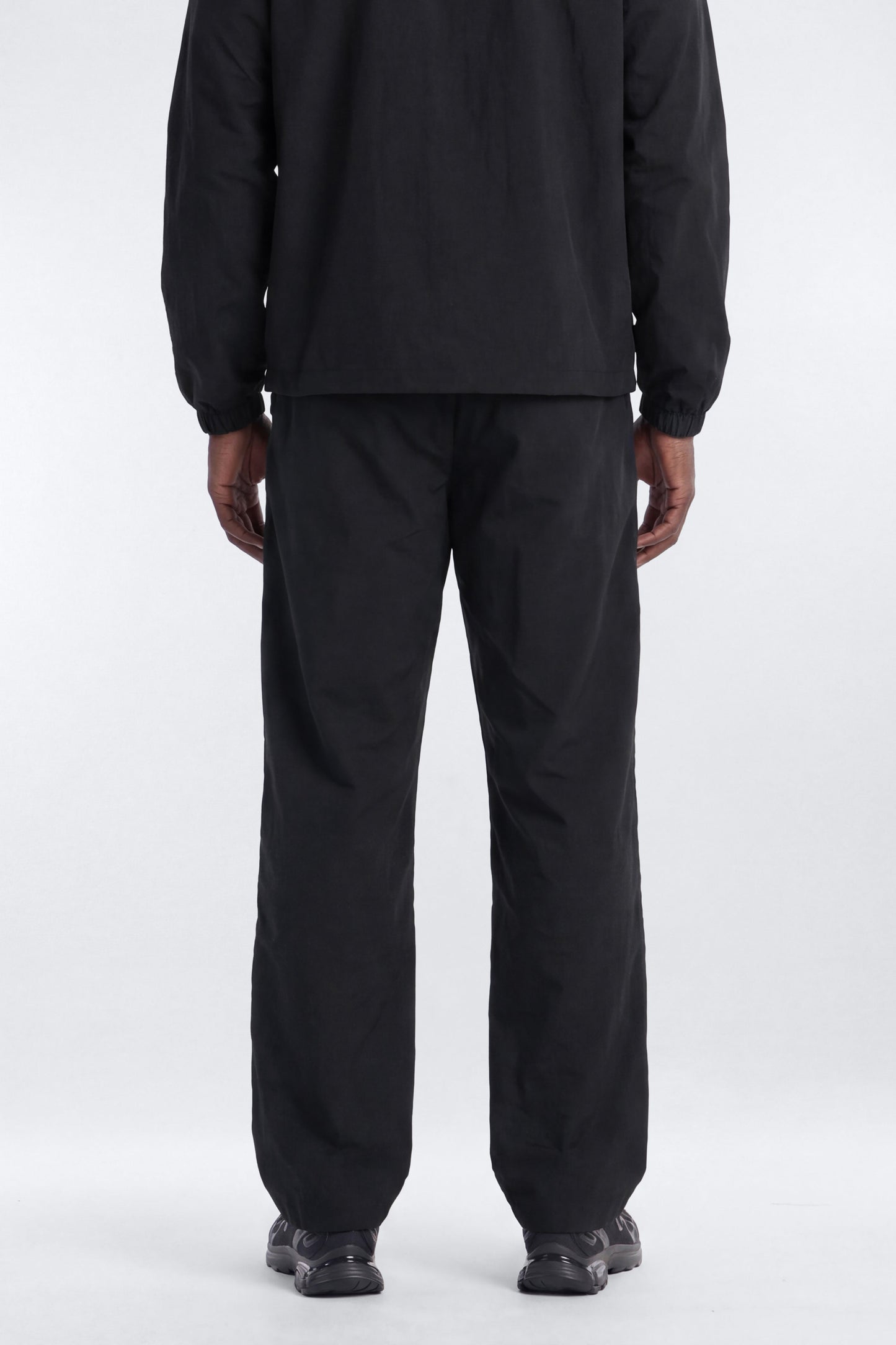 CoreNylon 32″ Front Snap Active Pants - Black Fashion Nova