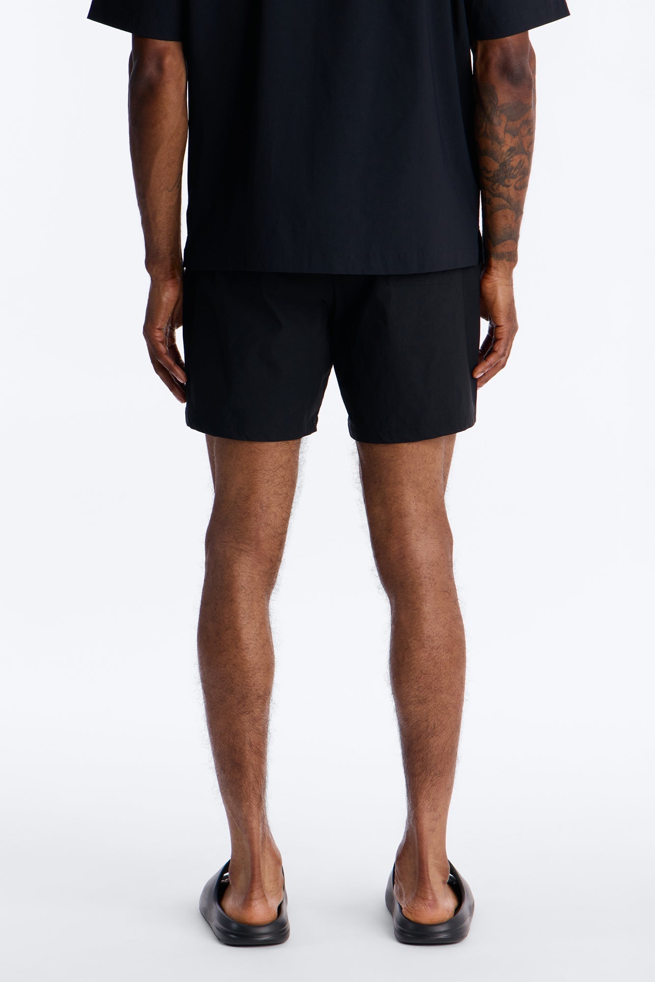 Montez Stretch Swim Trunk 7″ - Black Fashion Nova