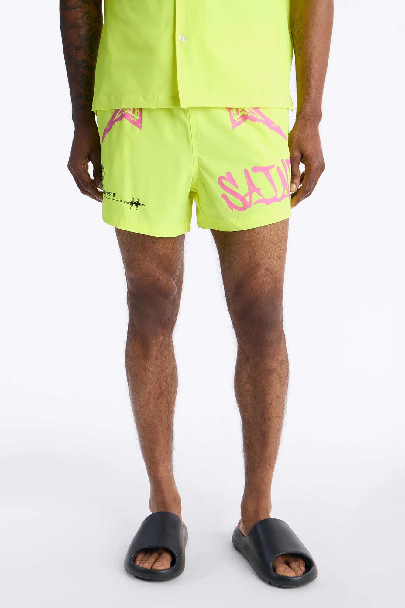 Saints And Stars Swim Trunk 4″ - Yellow Fashion Nova