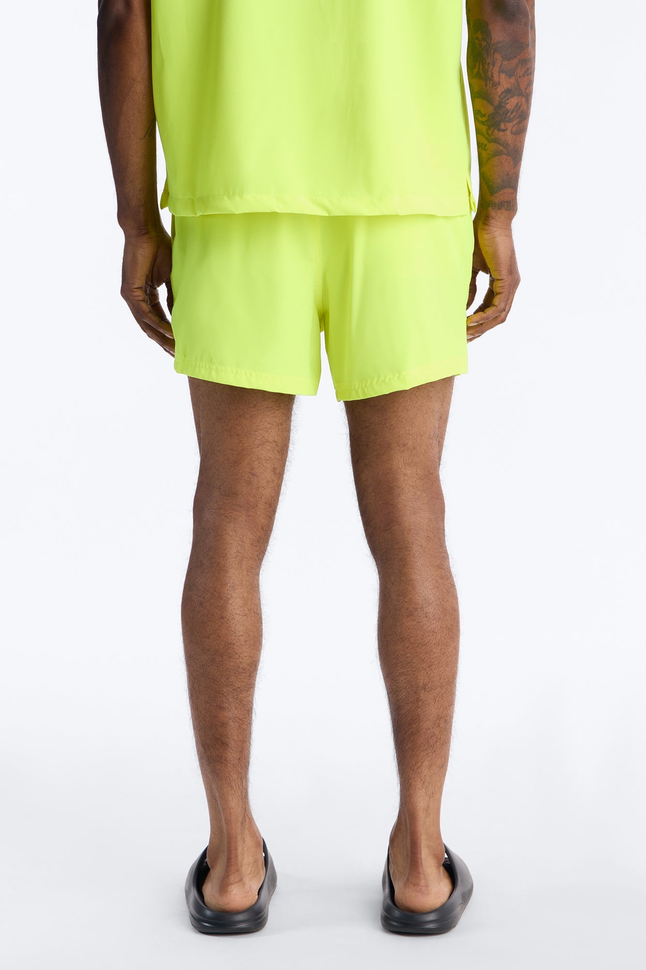 Saints And Stars Swim Trunk 4″ - Yellow Fashion Nova