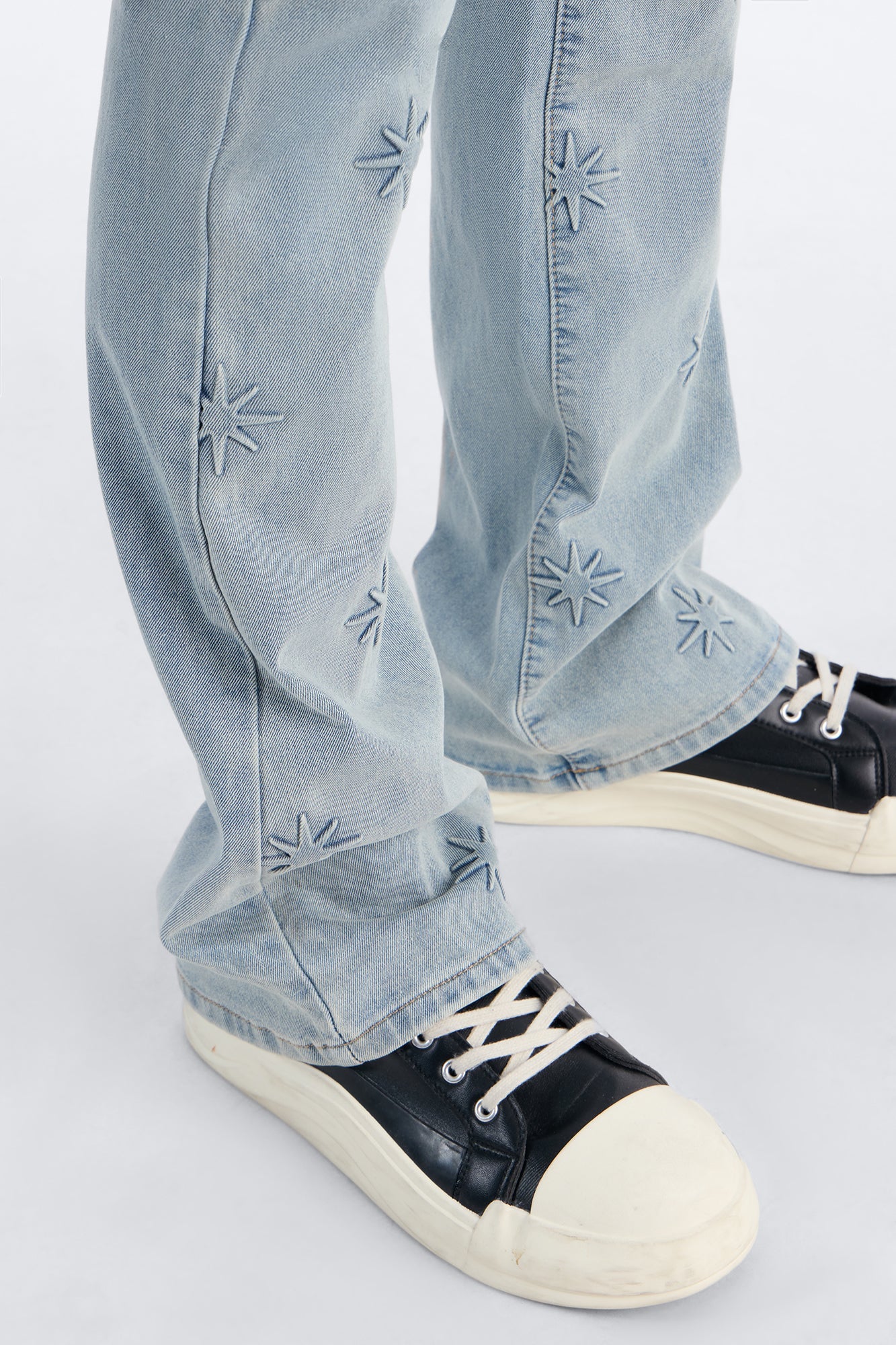 Stacked Slim Flare Embossed Supernova Jeans - Light Wash Fashion Nova