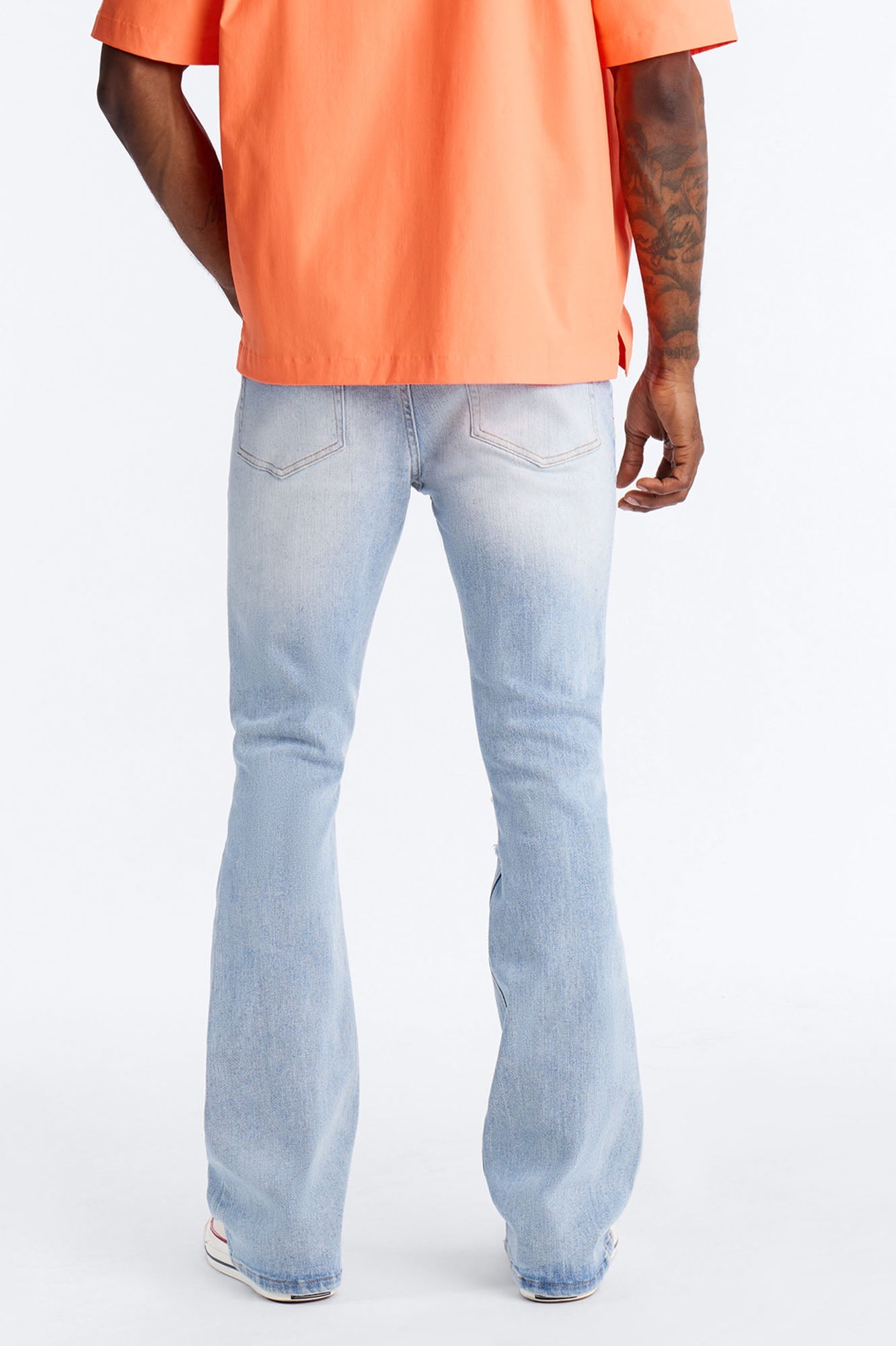 Essential Destroyed Stacked Skinny Flare Stretch Jean - Light Blue Wash Fashion Nova