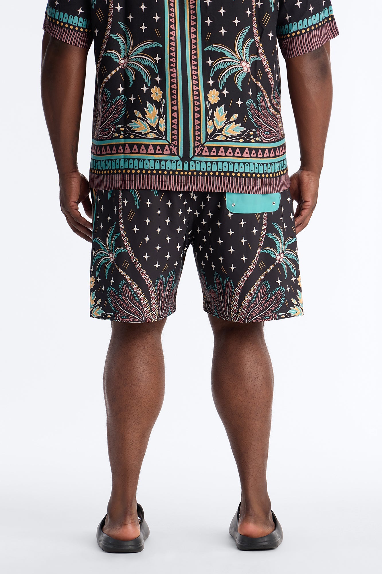 Tropical Twilight Resort Swim Trunk 7″ - Black Fashion Nova