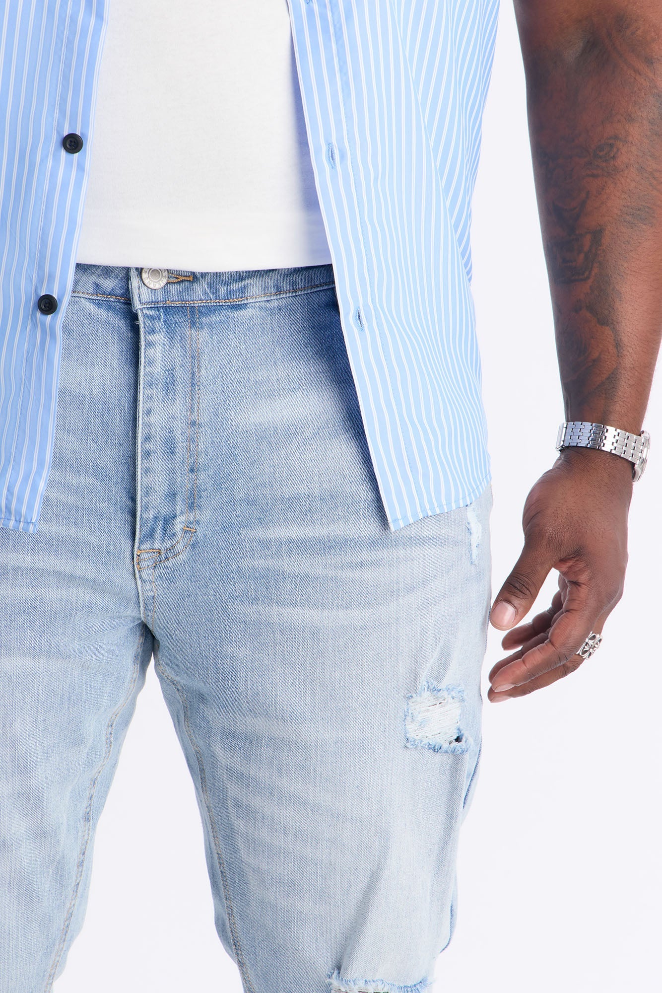 Essential Destroyed Stacked Skinny Flare Stretch Jean - Light Blue Wash Fashion Nova