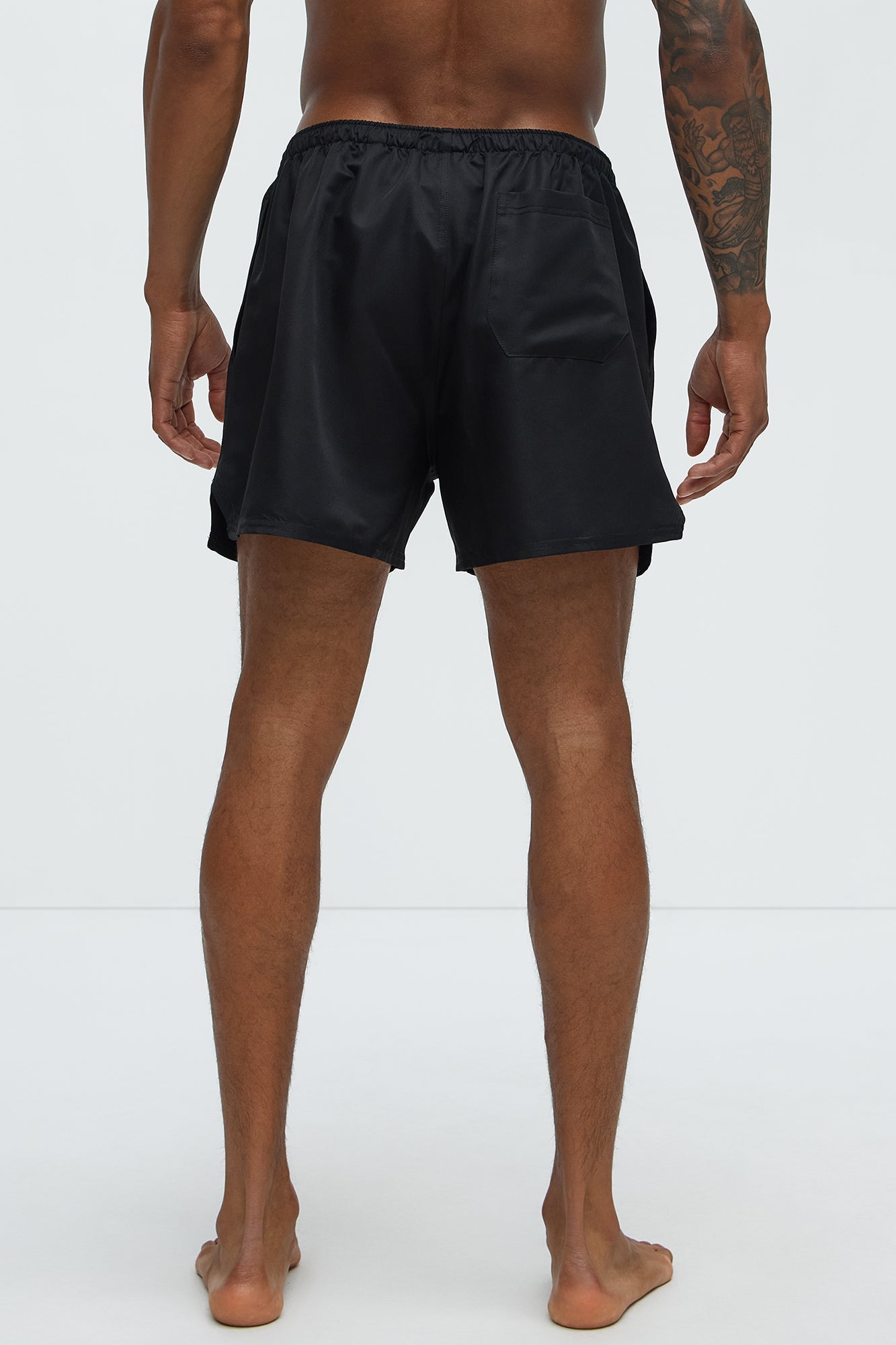 Loverboy Relaxed Swim Trunk 4″ - Black Fashion Nova