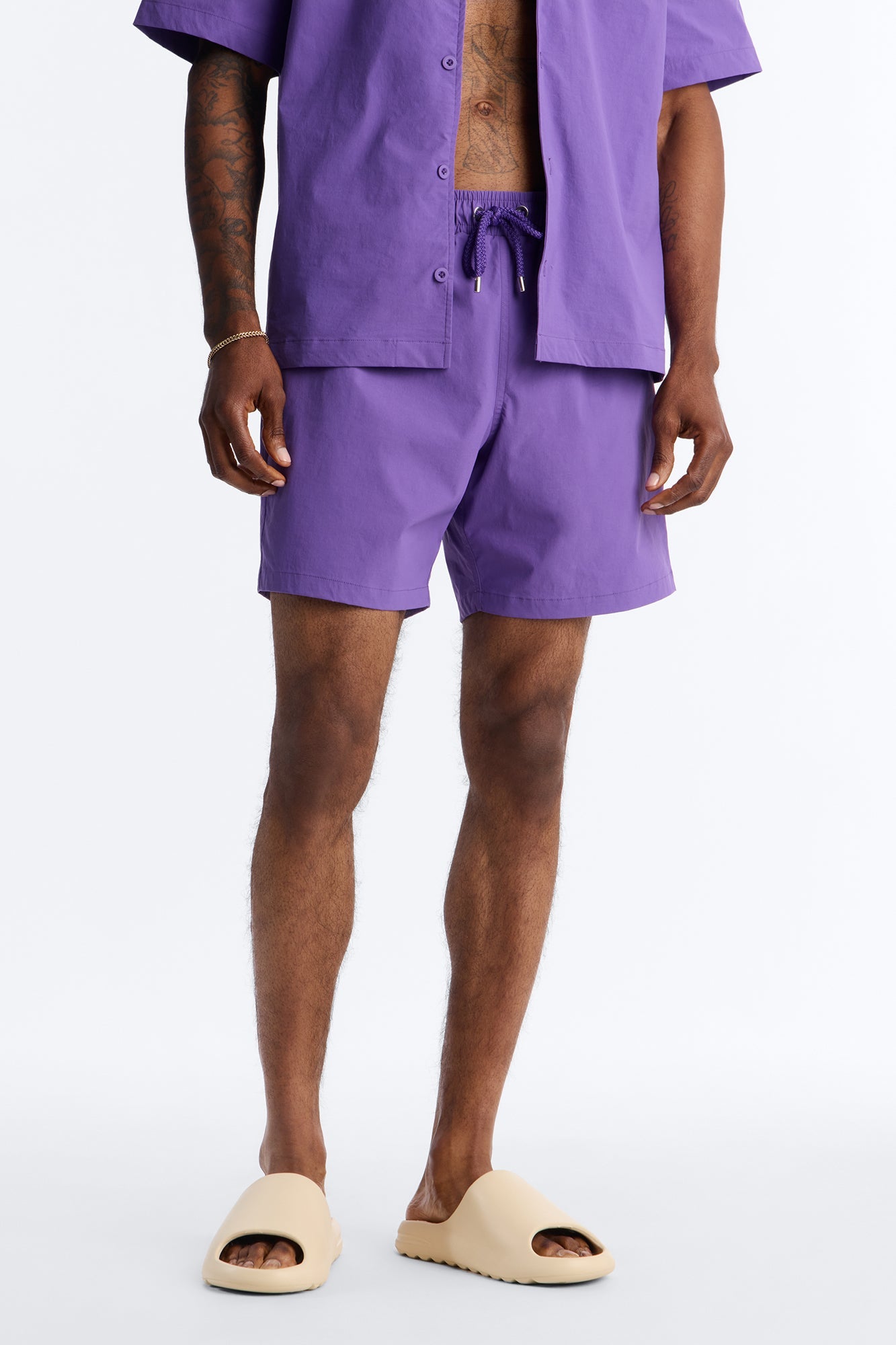 Montez Stretch Swim Trunk 7″ - Purple Fashion Nova