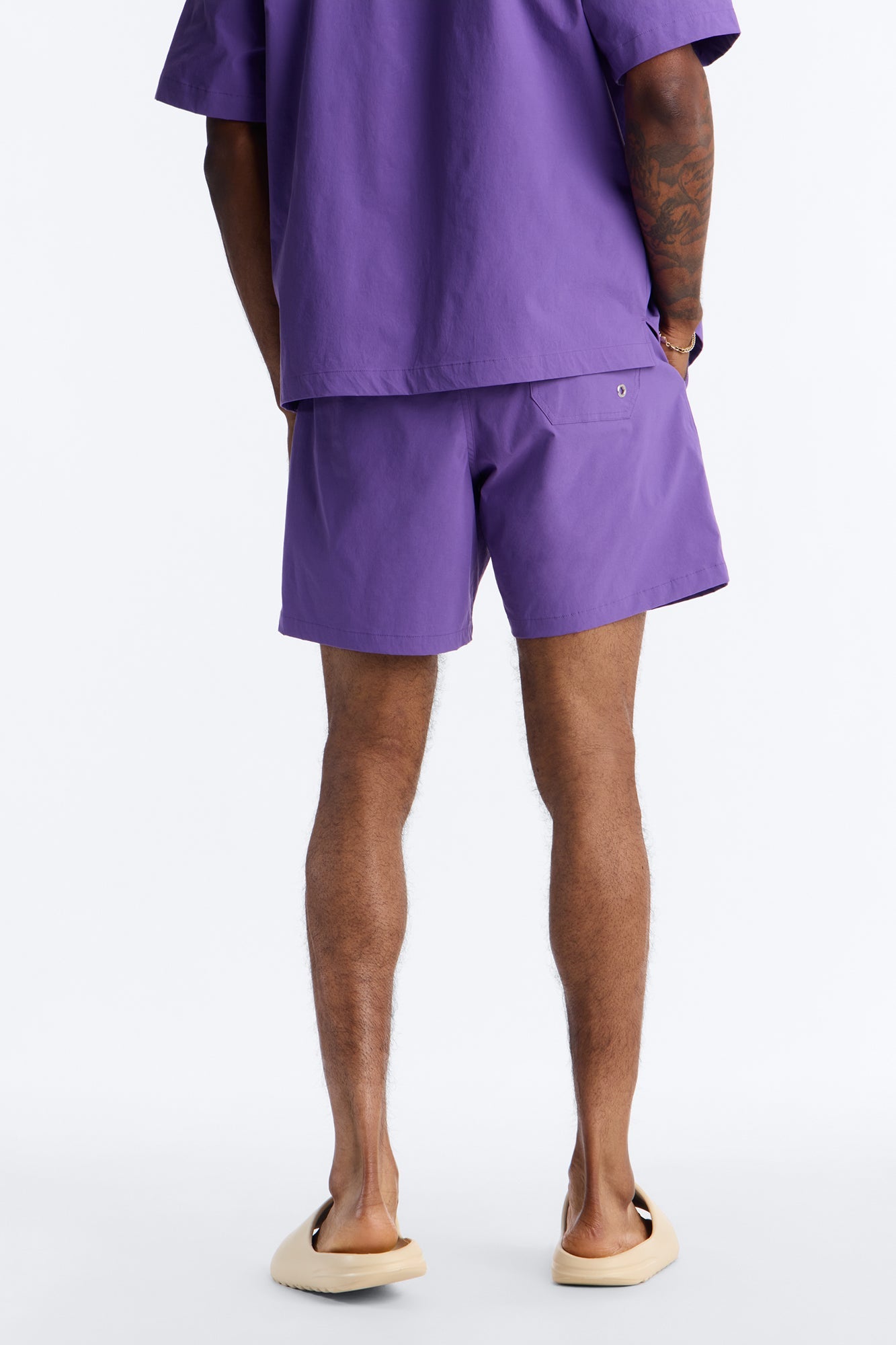 Montez Stretch Swim Trunk 7″ - Purple Fashion Nova