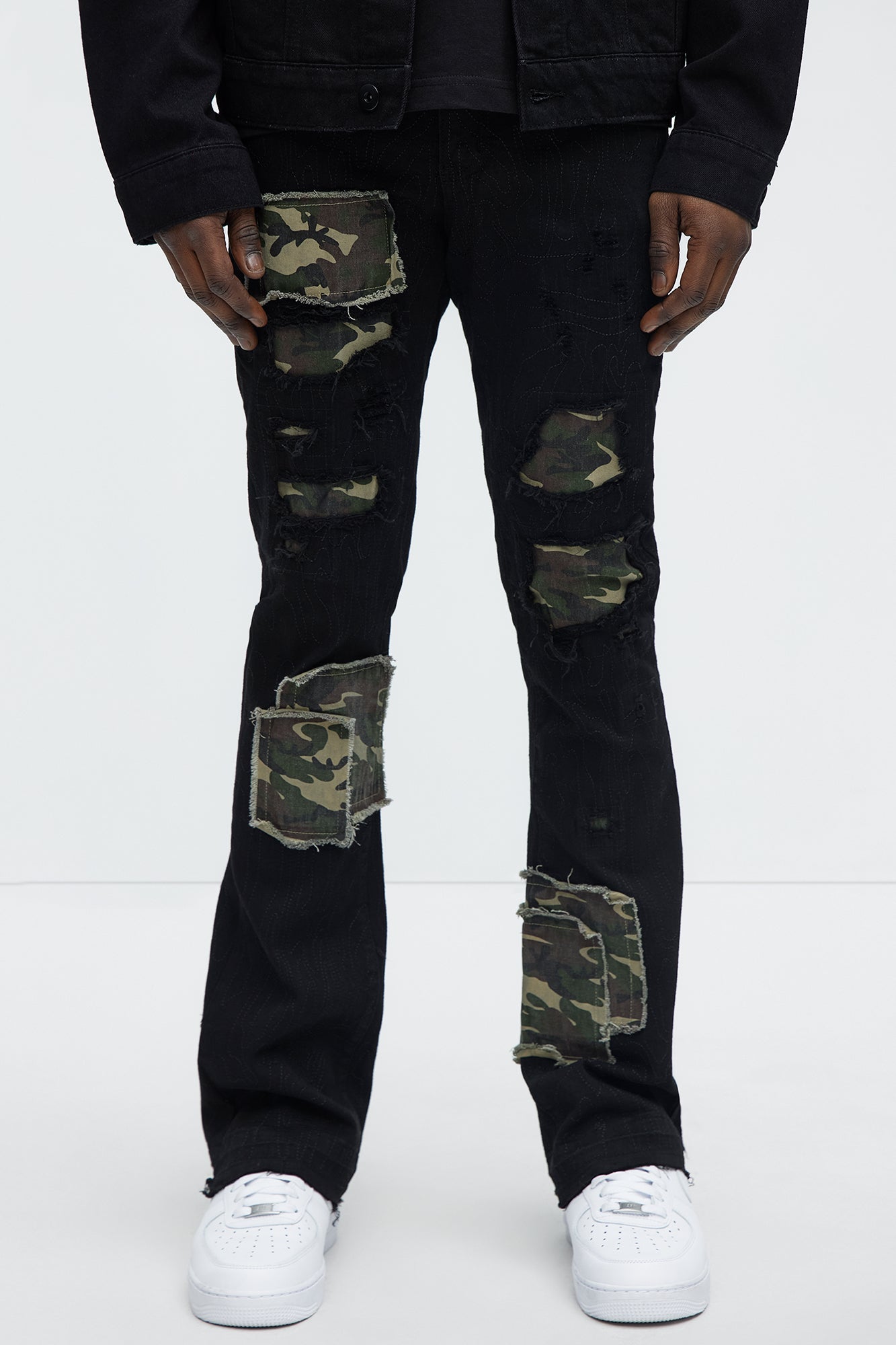 Hint Of Camo Stacked Skinny Flare Jeans - Black Fashion Nova
