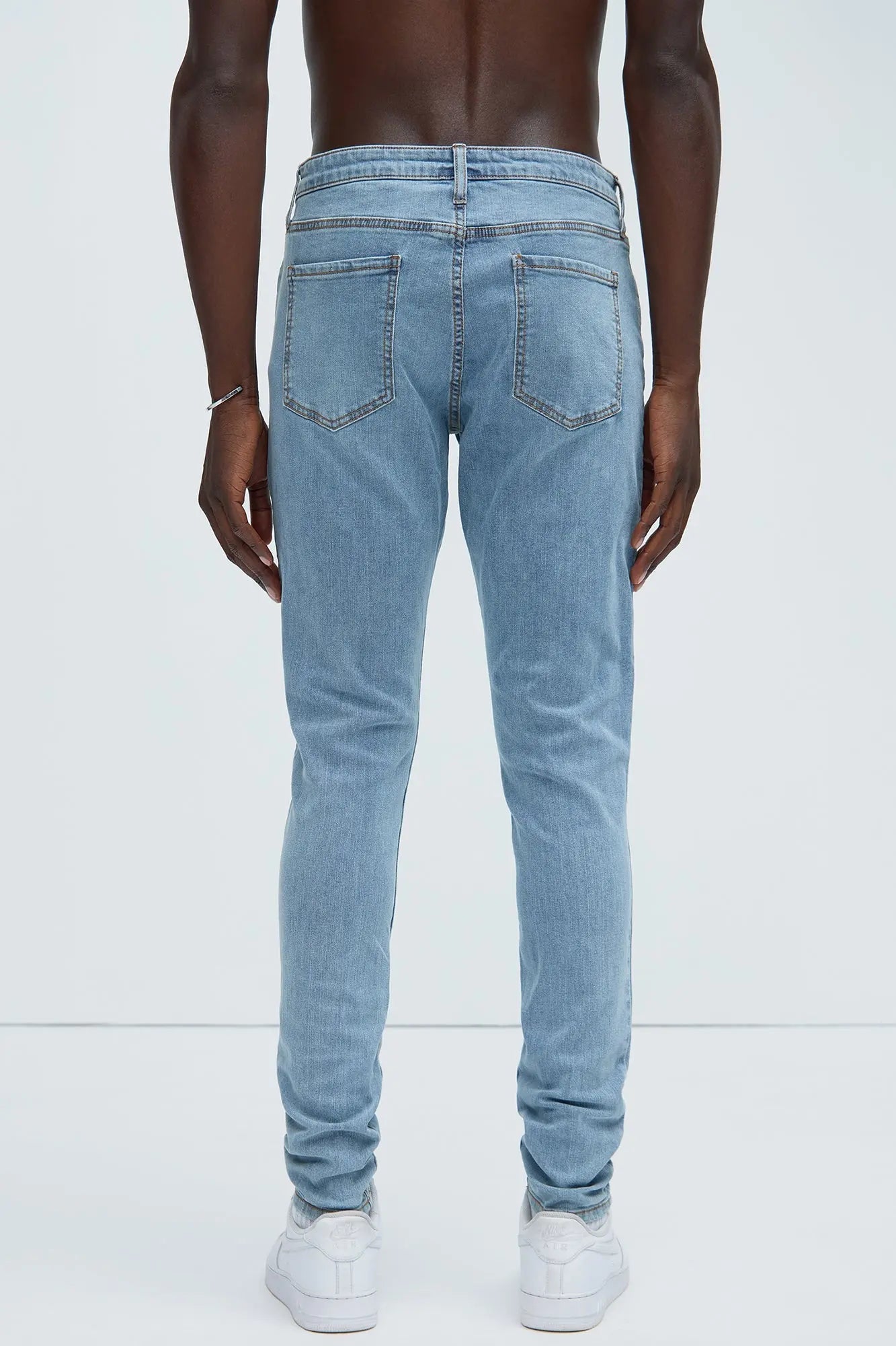 Cornell Stacked Skinny Jeans - Blue Wash Fashion Nova