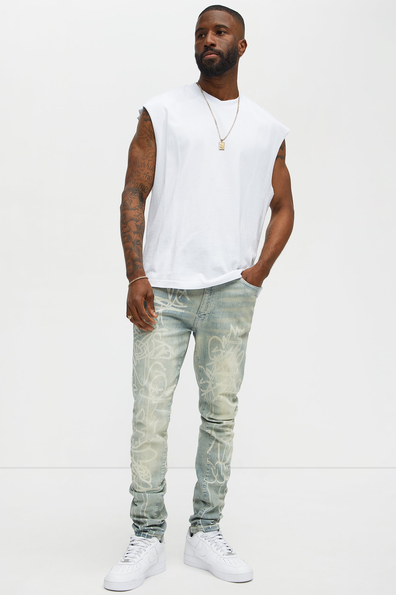 Graffiti Art Stacked Skinny Jeans - Light Wash Fashion Nova
