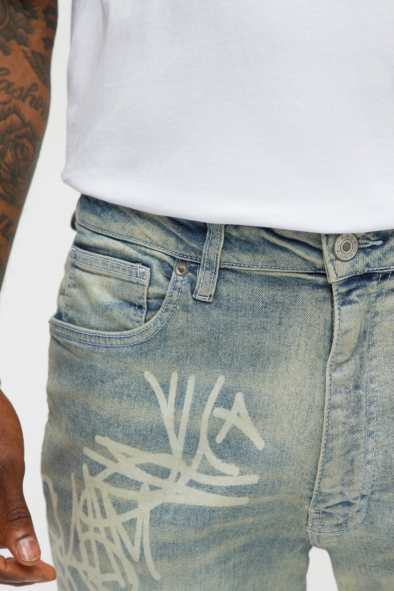 Graffiti Art Stacked Skinny Jeans - Light Wash Fashion Nova