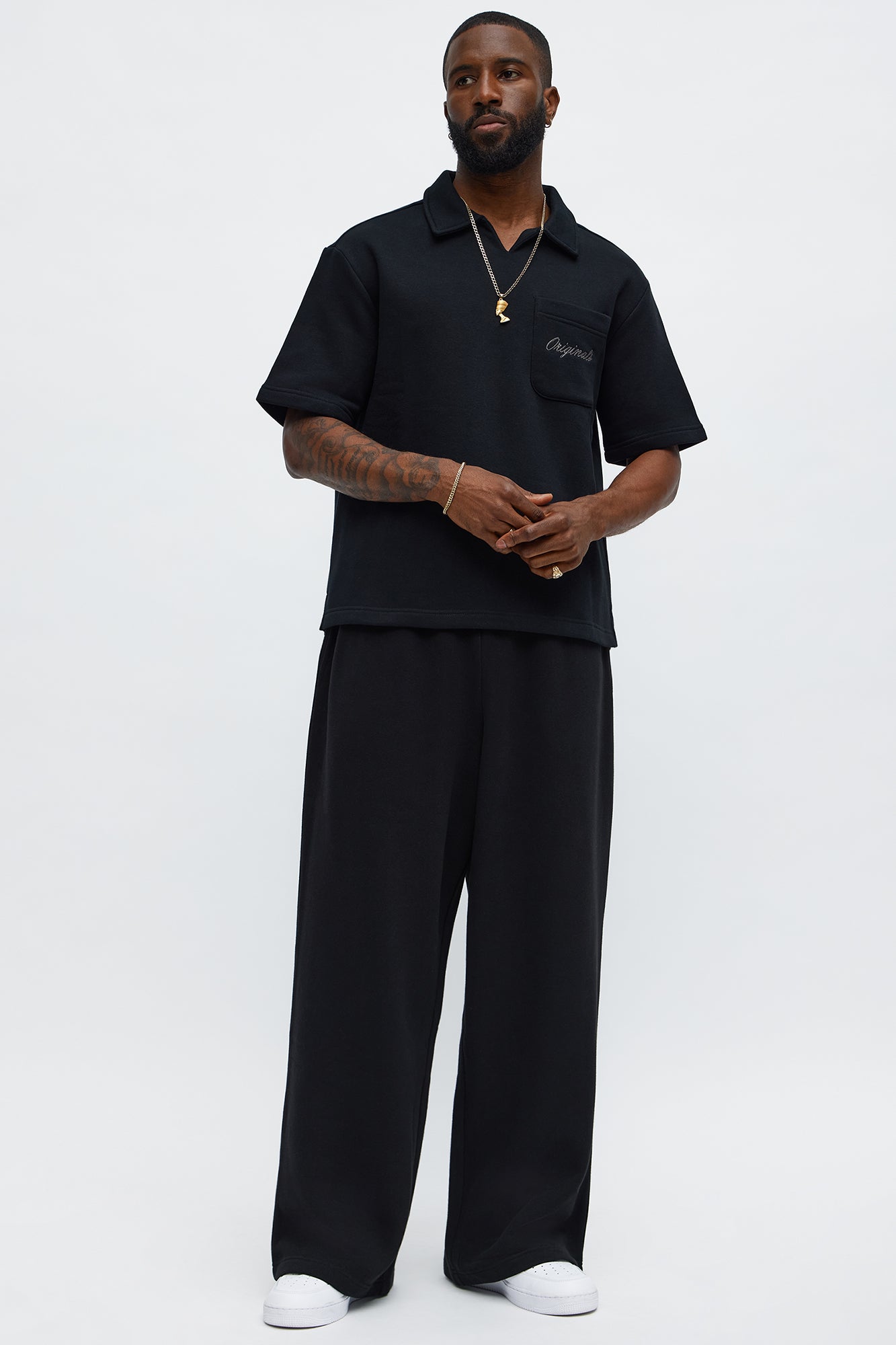 Tyson Happy Mistake Short Sleeve Polo - Black Fashion Nova