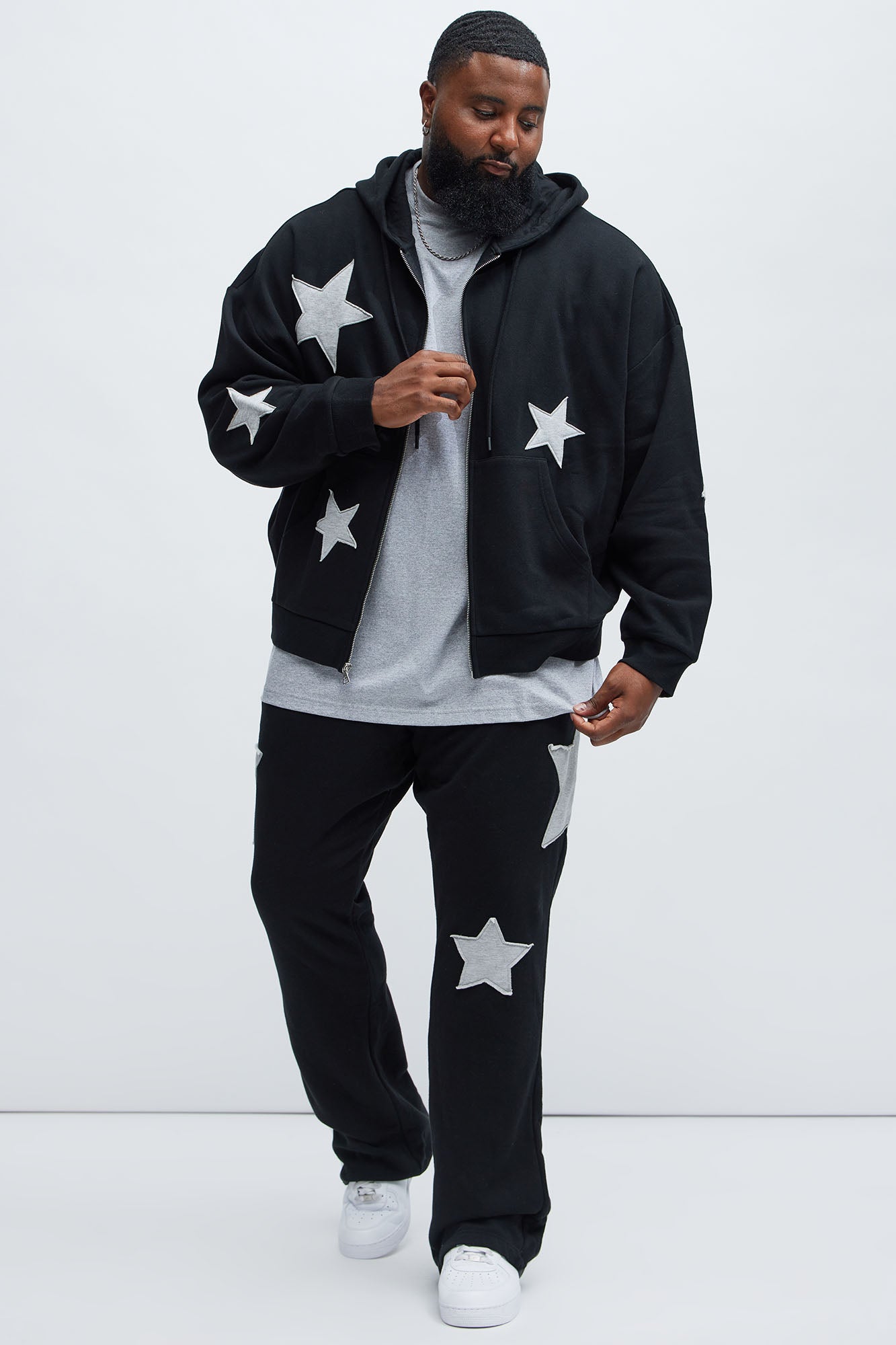 Tyson Stars Skinny Flared Sweatpants - Black Fashion Nova