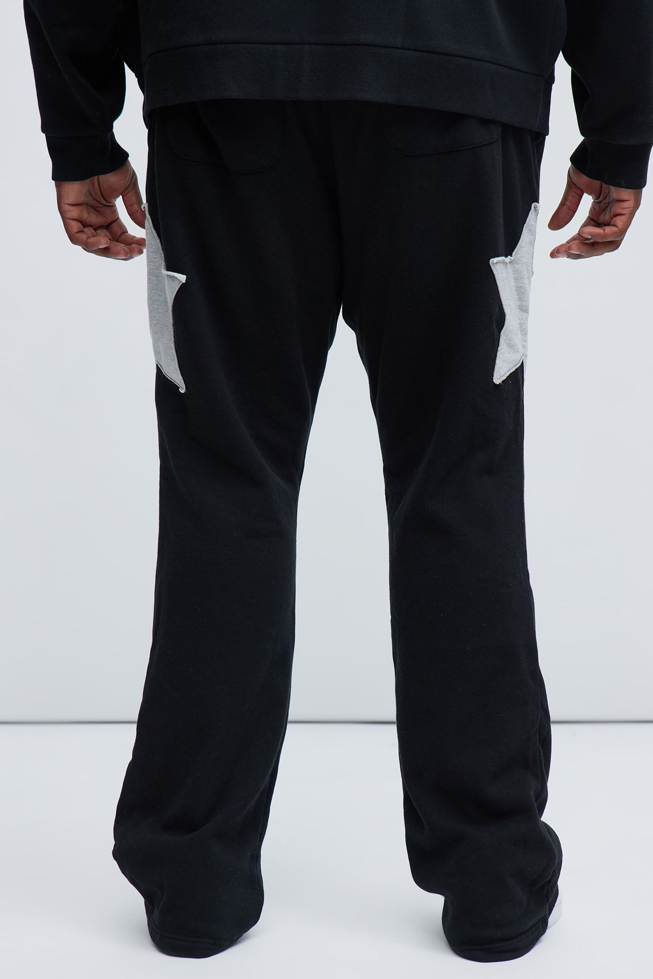 Tyson Stars Skinny Flared Sweatpants - Black Fashion Nova