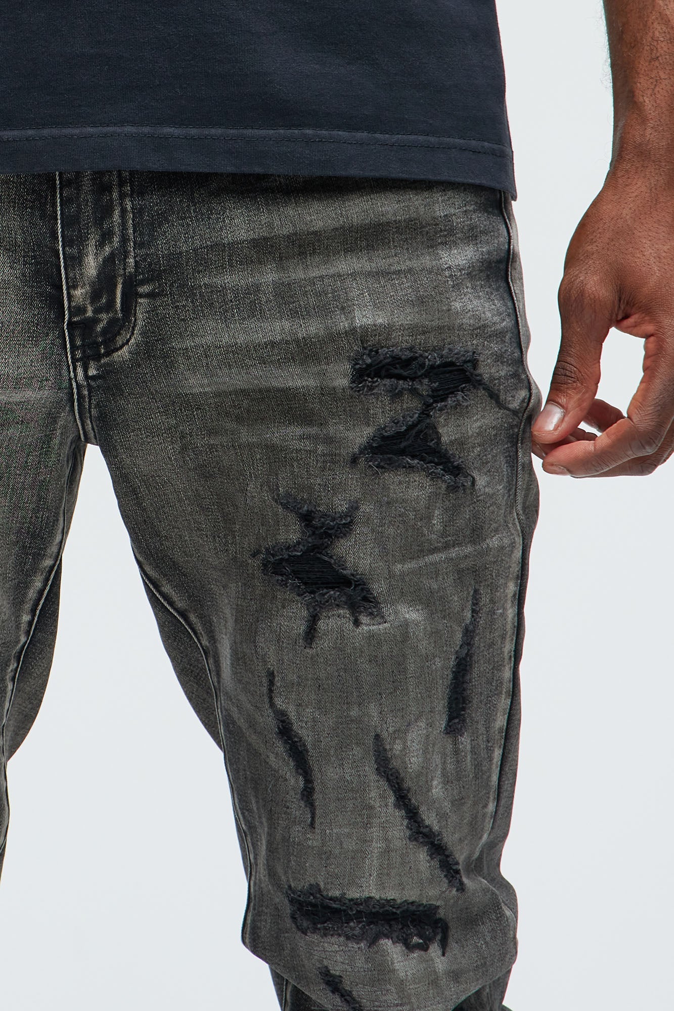 Put You On Spray Painted Stacked Skinny Jeans - Black Fashion Nova
