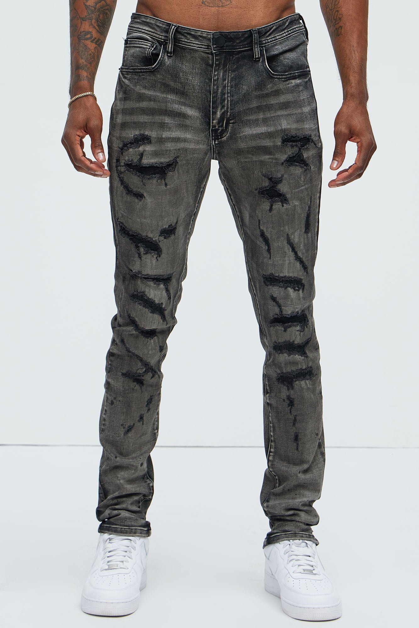 Put You On Spray Painted Stacked Skinny Jeans - Black Fashion Nova
