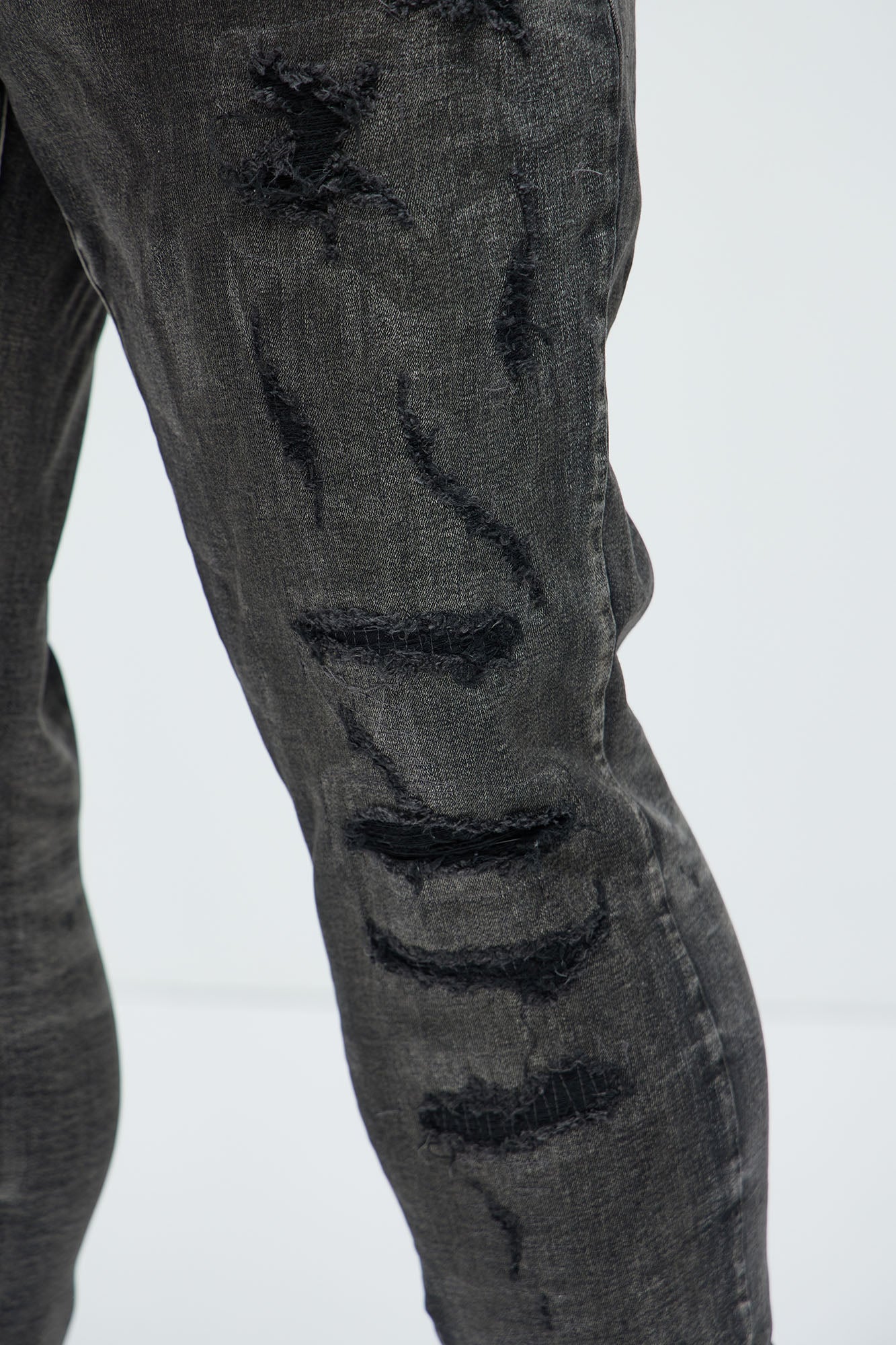 Put You On Spray Painted Stacked Skinny Jeans - Black Fashion Nova