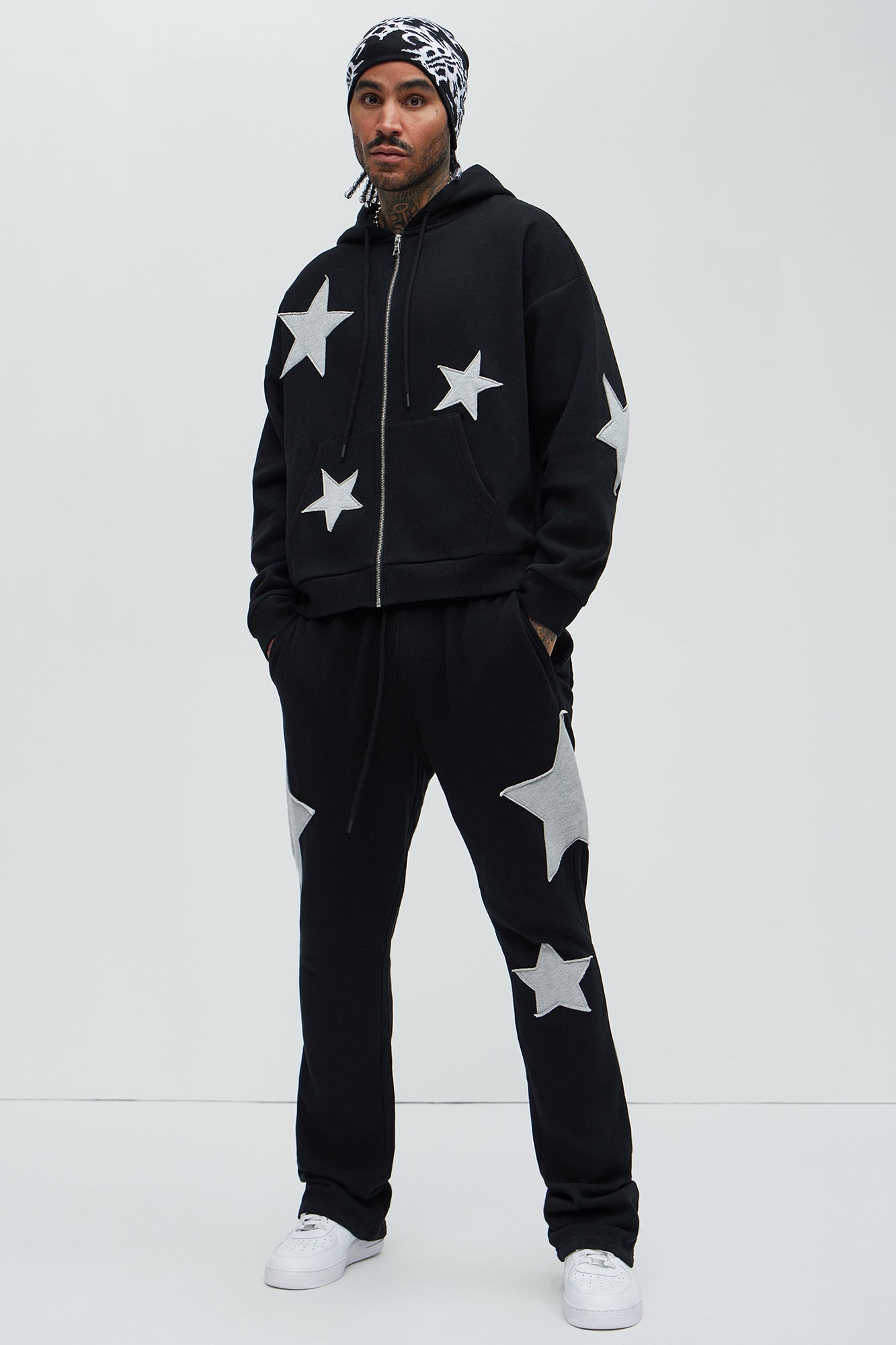 Tyson Stars Skinny Flared Sweatpants - Black Fashion Nova